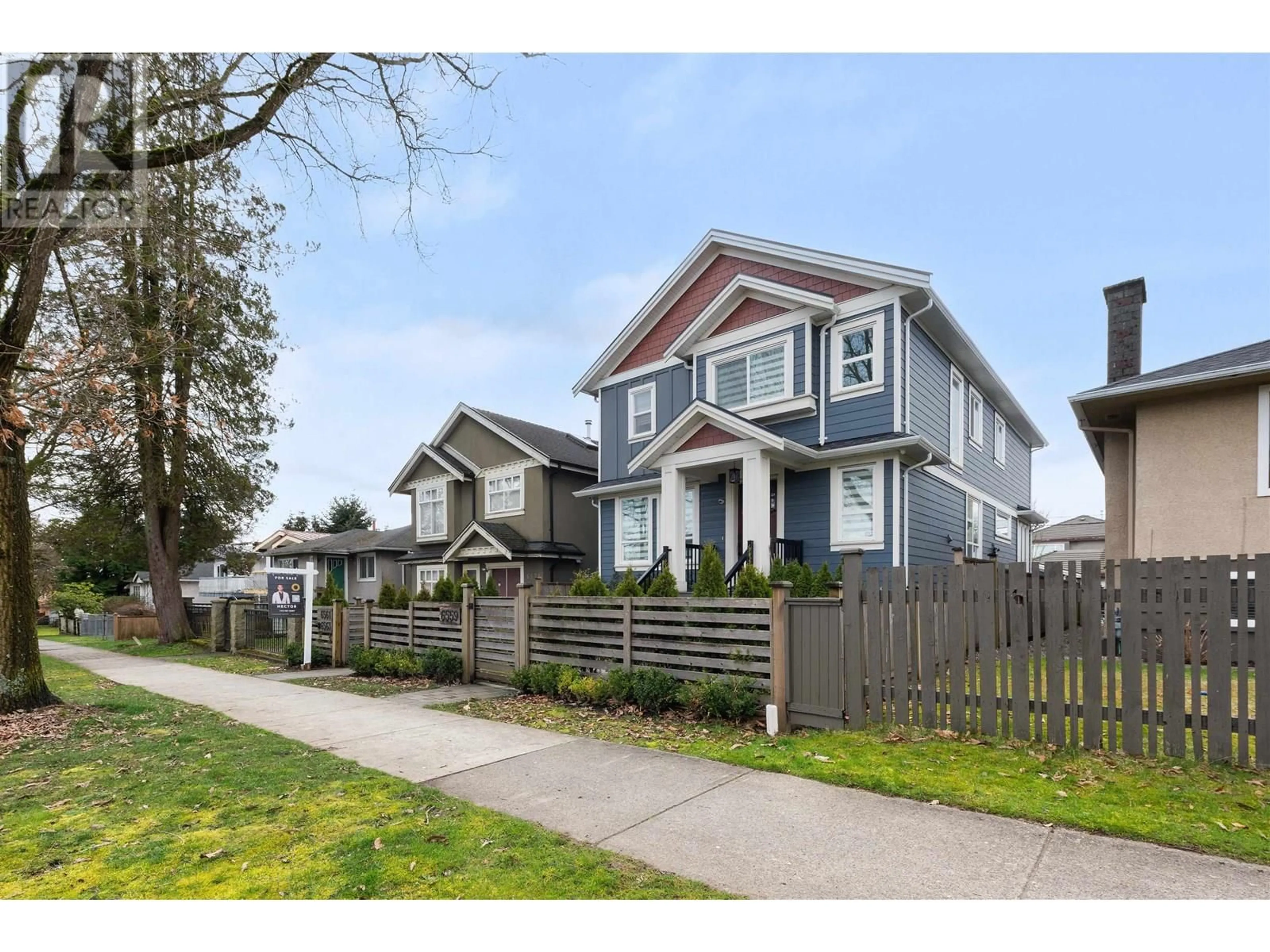 Home with vinyl exterior material, street for 6561 INVERNESS STREET, Vancouver British Columbia V5X4G1
