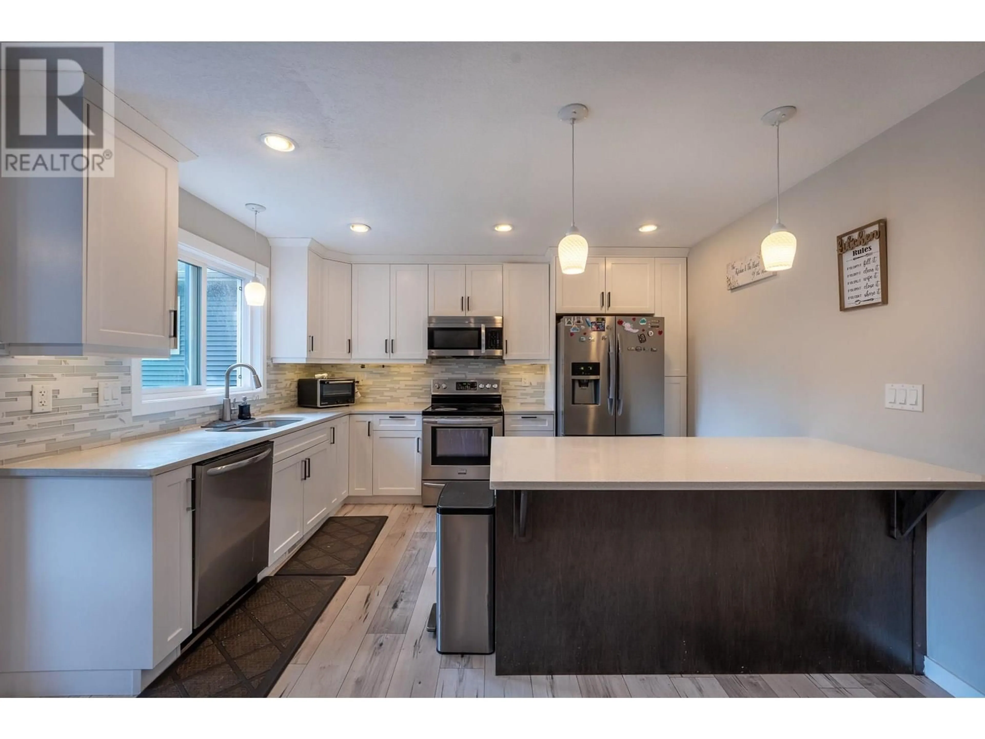 Open concept kitchen, unknown for 7669 CREEKSIDE WAY, Prince George British Columbia V2N0C2