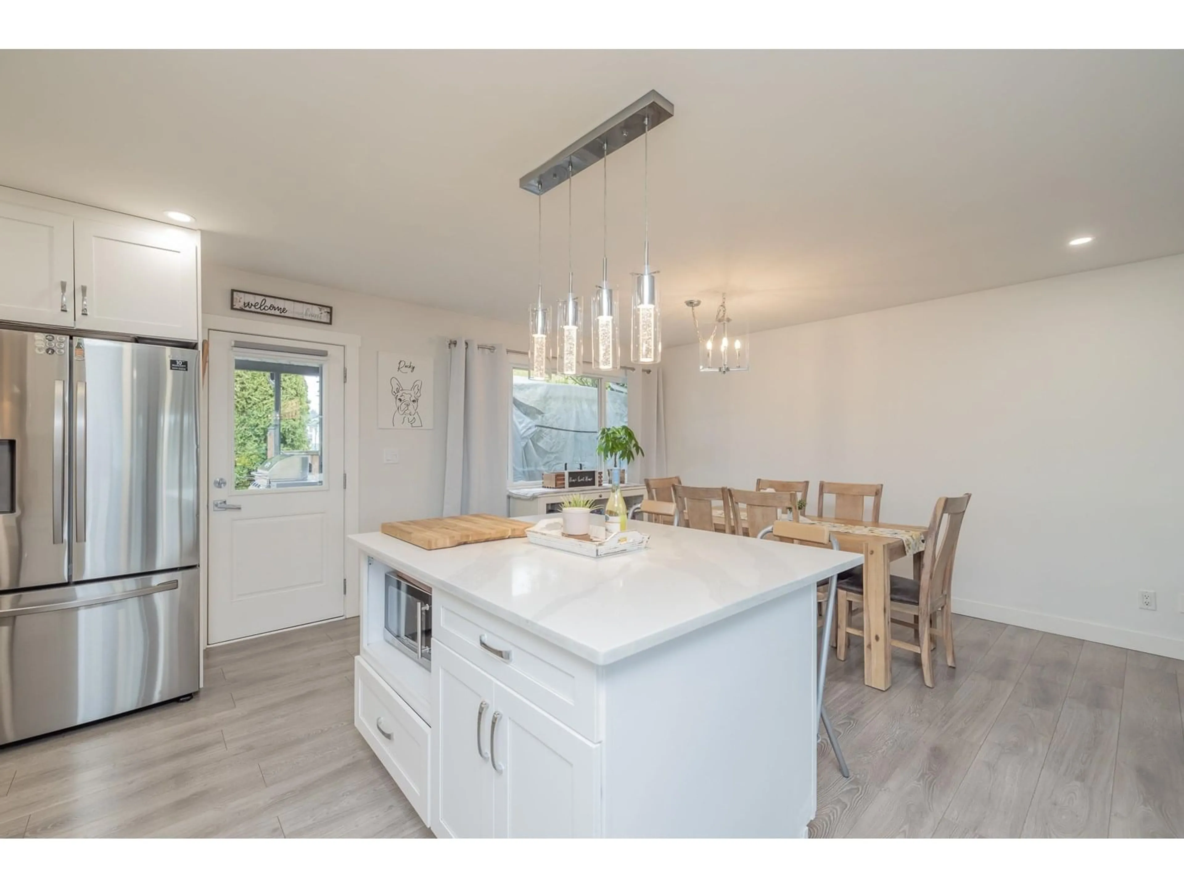 Open concept kitchen, wood/laminate floor for 32073 WESTVIEW, Mission British Columbia V2V1X7