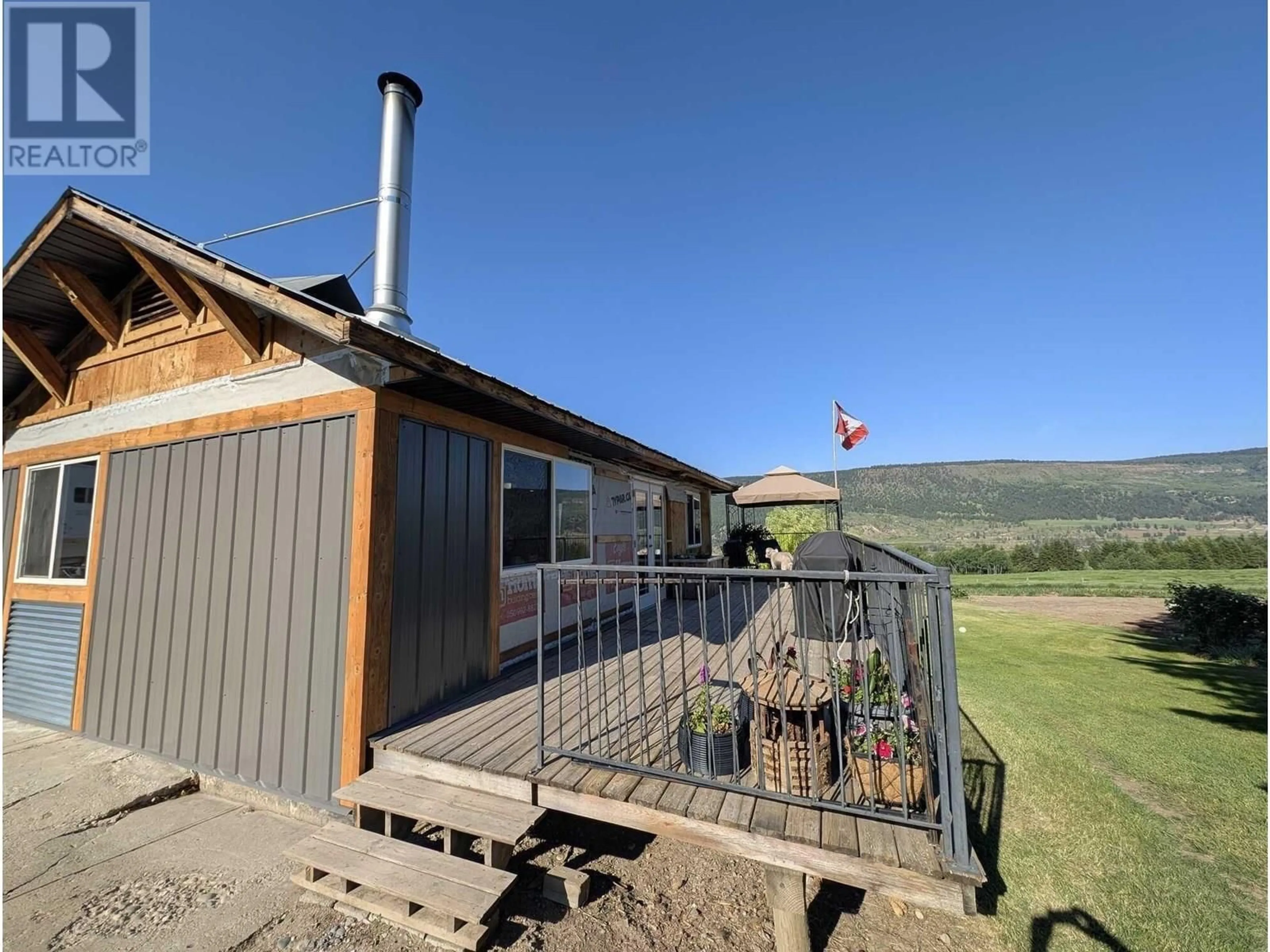 A pic from outside/outdoor area/front of a property/back of a property/a pic from drone, mountain view for 10281 LEE ROAD, Williams Lake British Columbia V2J6R6