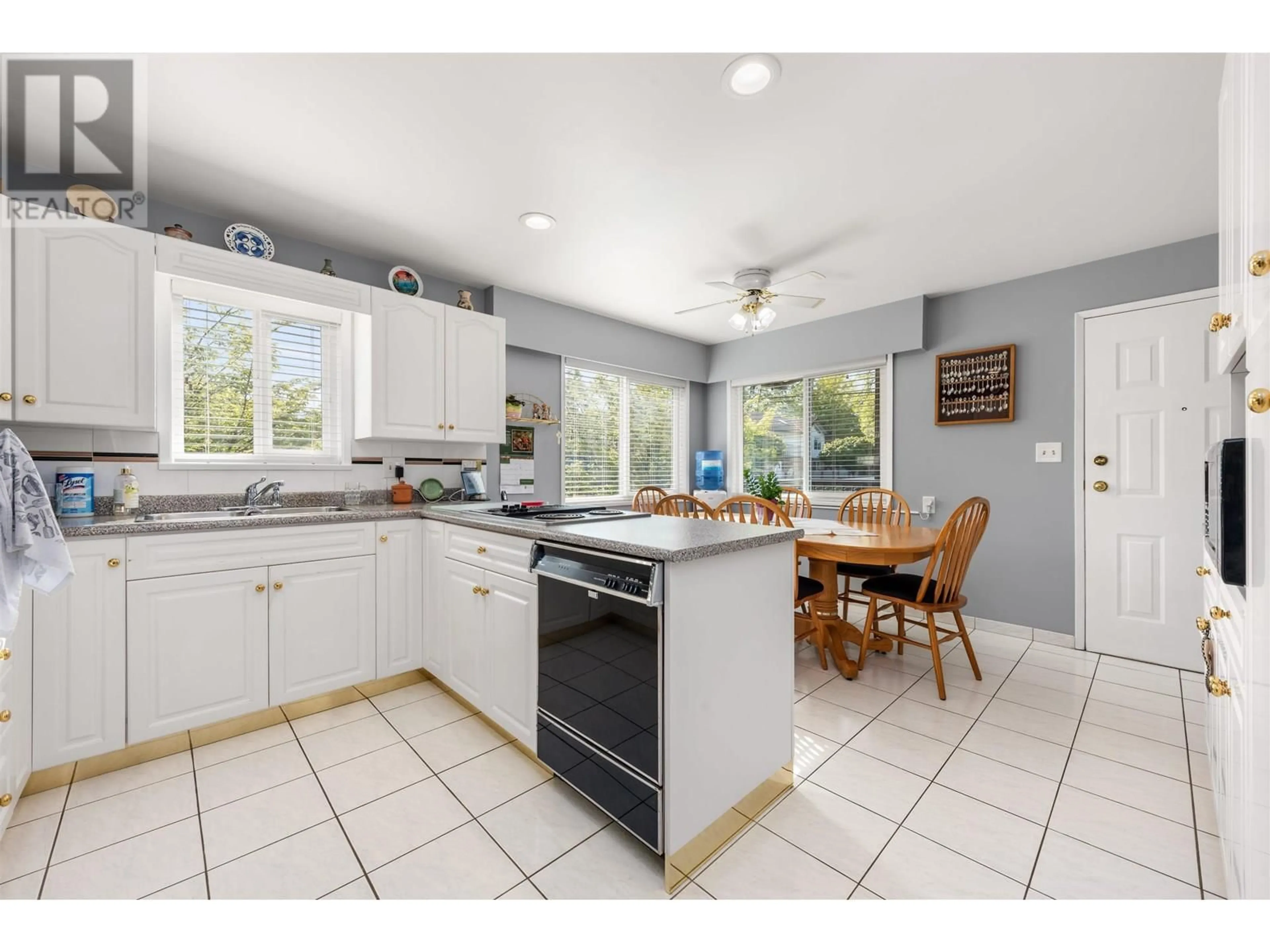 Open concept kitchen, ceramic/tile floor for 1425 SLOCAN STREET, Vancouver British Columbia V5K4X5