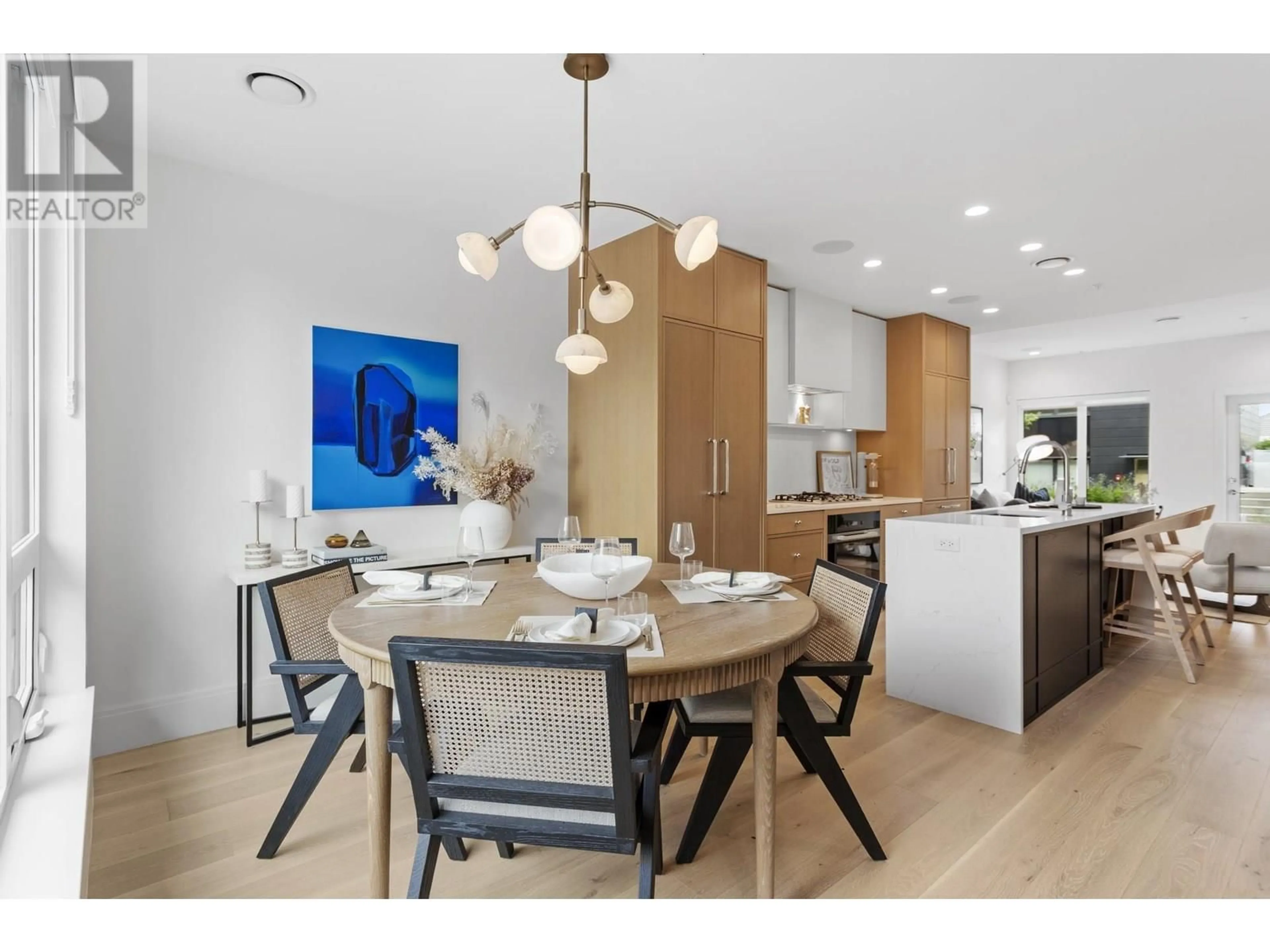 Open concept kitchen, wood/laminate floor for 559 26TH AVENUE, Vancouver British Columbia V5Z2E4