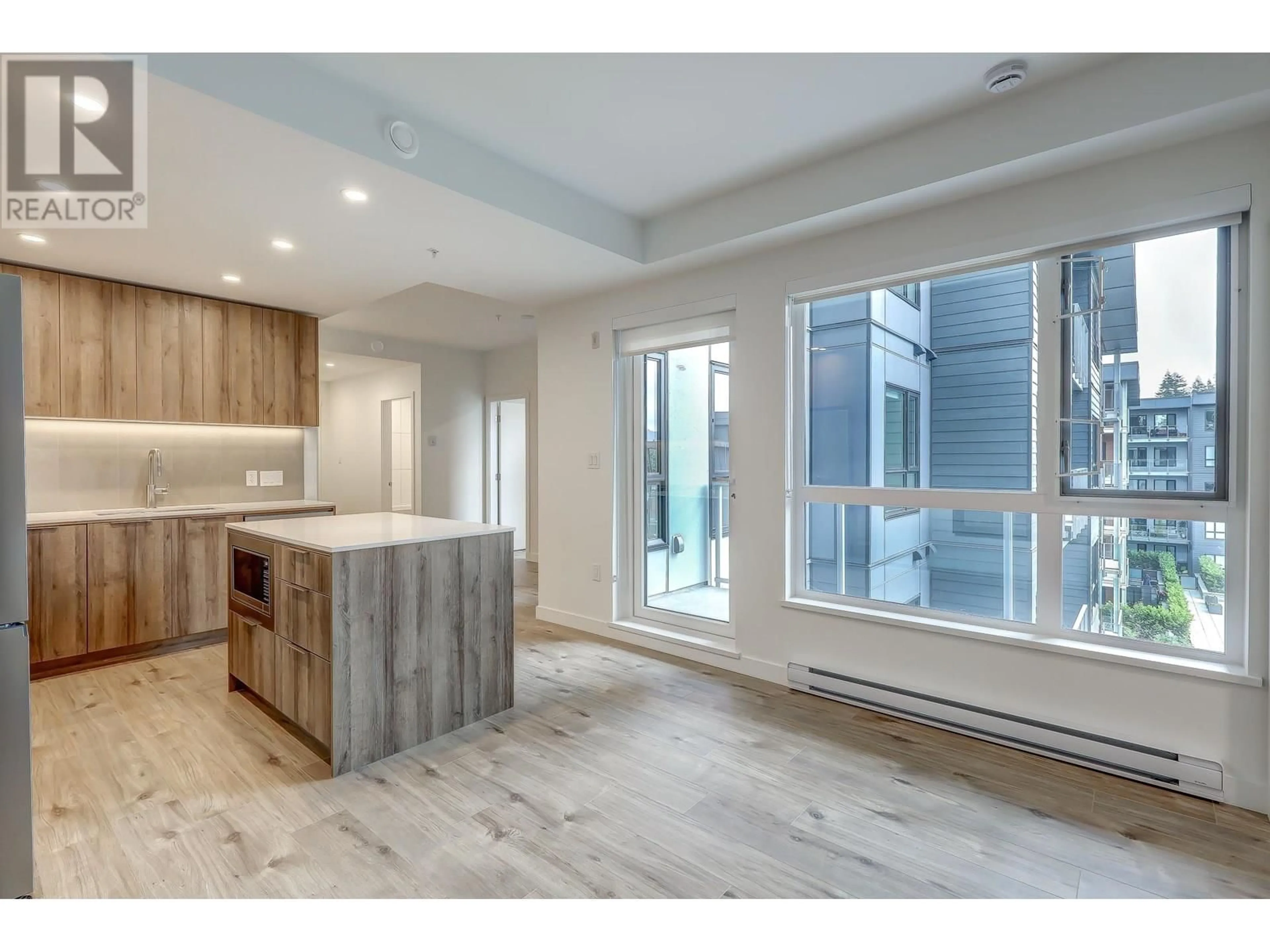 Open concept kitchen, unknown for 517 - 3594 MALSUM DRIVE, North Vancouver British Columbia V7G0B5