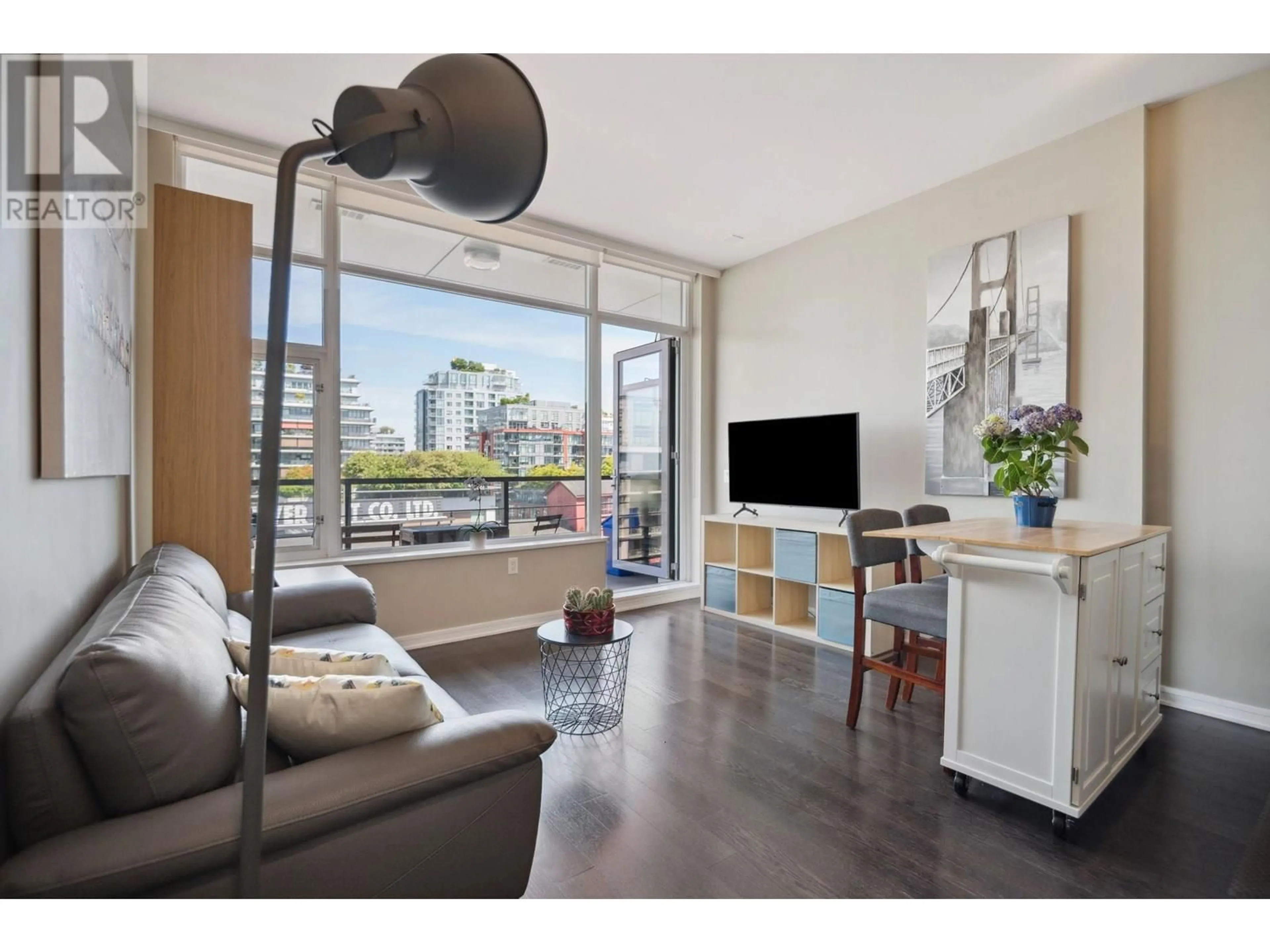 Living room with furniture, wood/laminate floor for 706 - 123 1ST AVENUE, Vancouver British Columbia V5Y0E2