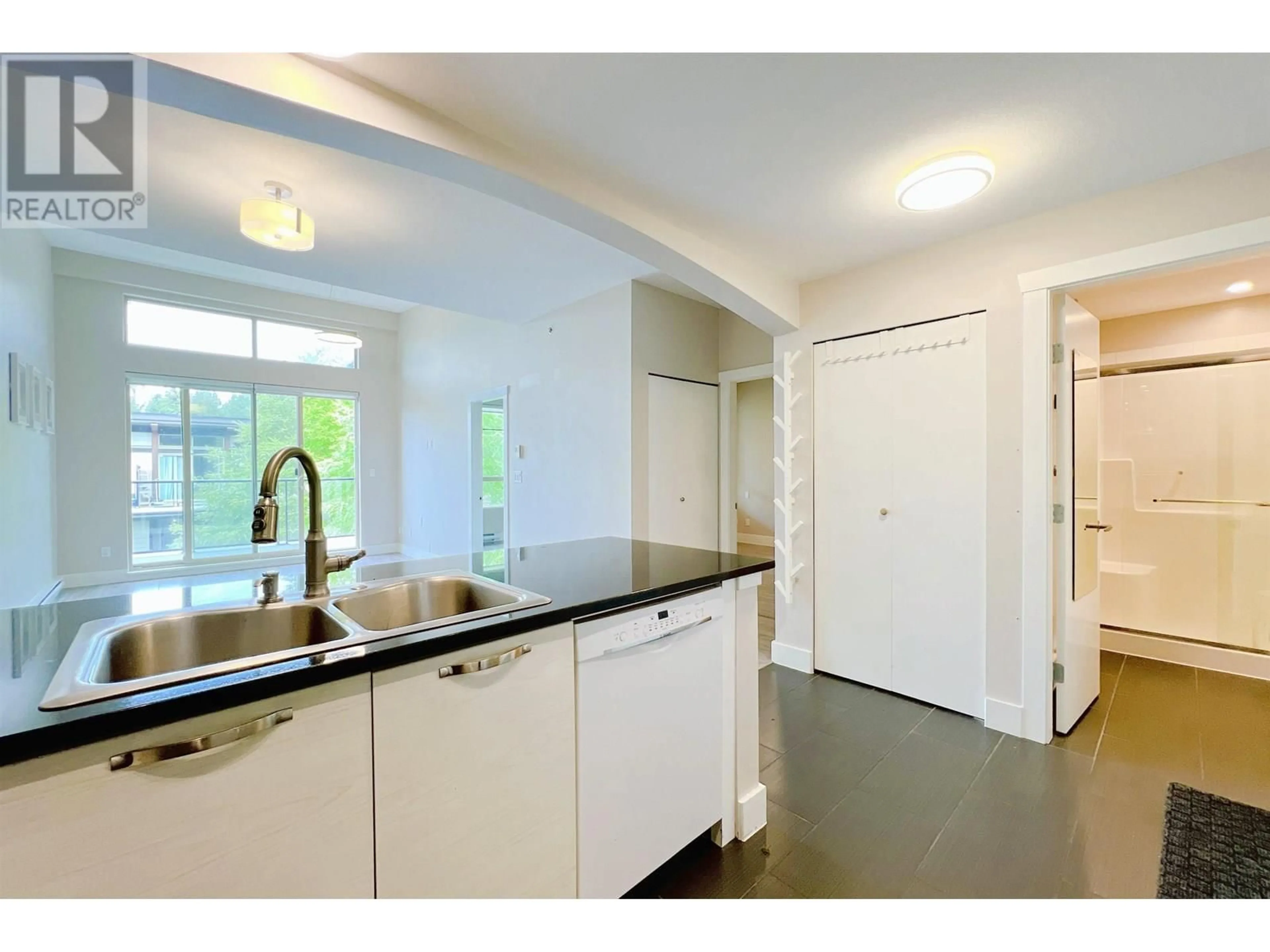 Open concept kitchen, unknown for 405 - 7488 BYRNEPARK WALK, Burnaby British Columbia V3N0B6