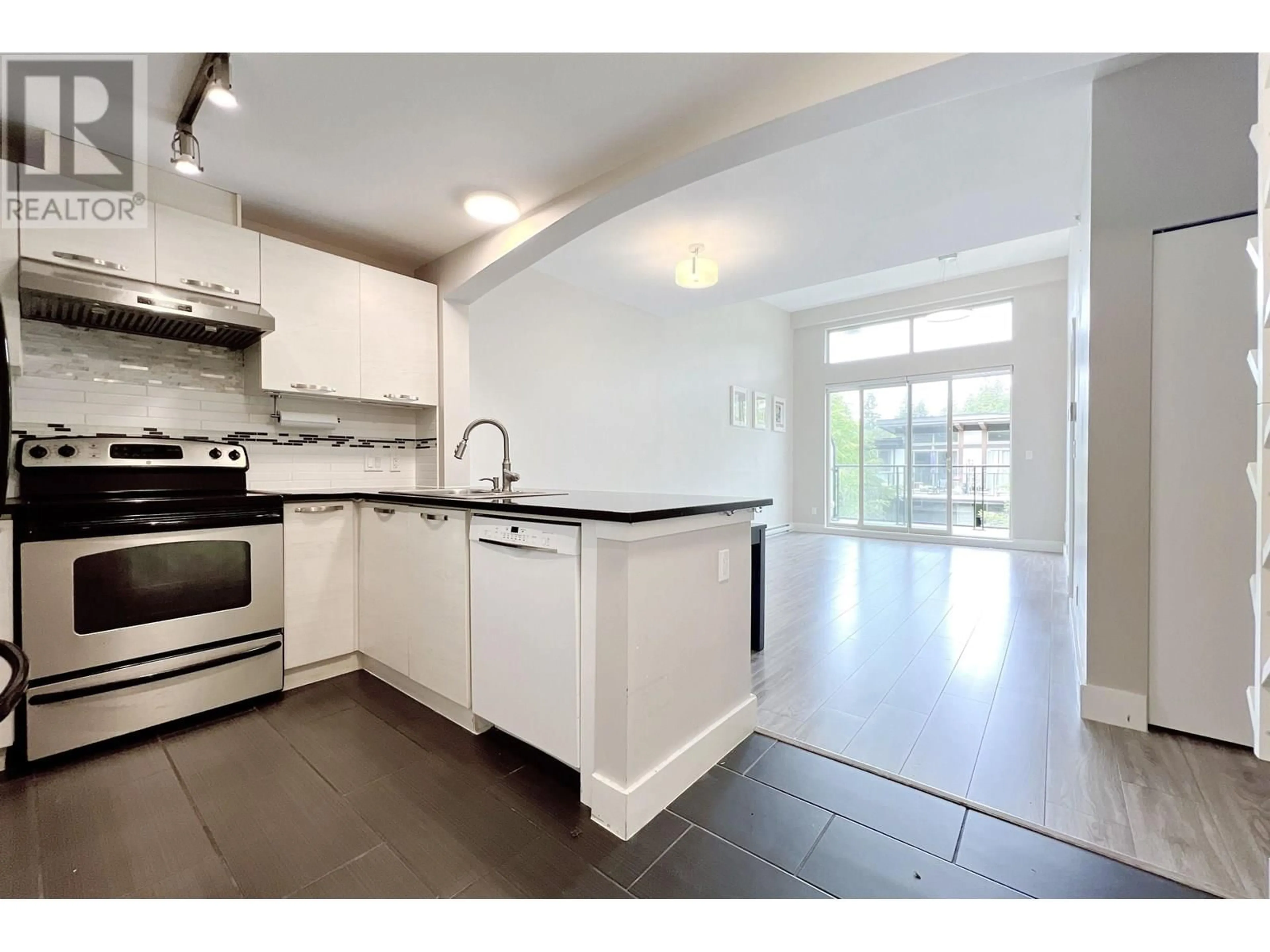 Open concept kitchen, unknown for 405 - 7488 BYRNEPARK WALK, Burnaby British Columbia V3N0B6