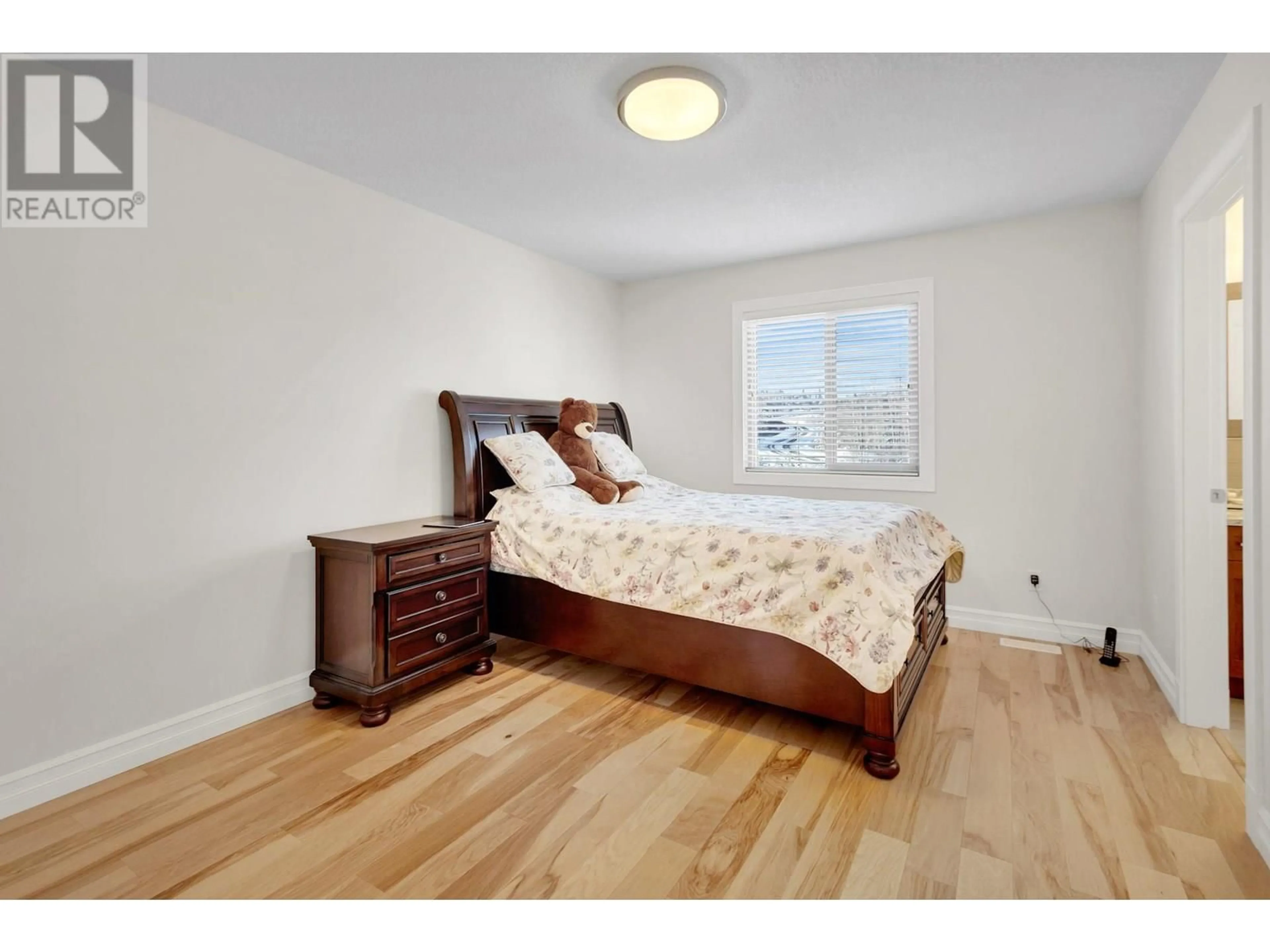 Bedroom with bed, wood/laminate floor for 3228 PARKVIEW CRESCENT, Prince George British Columbia V2N0E7