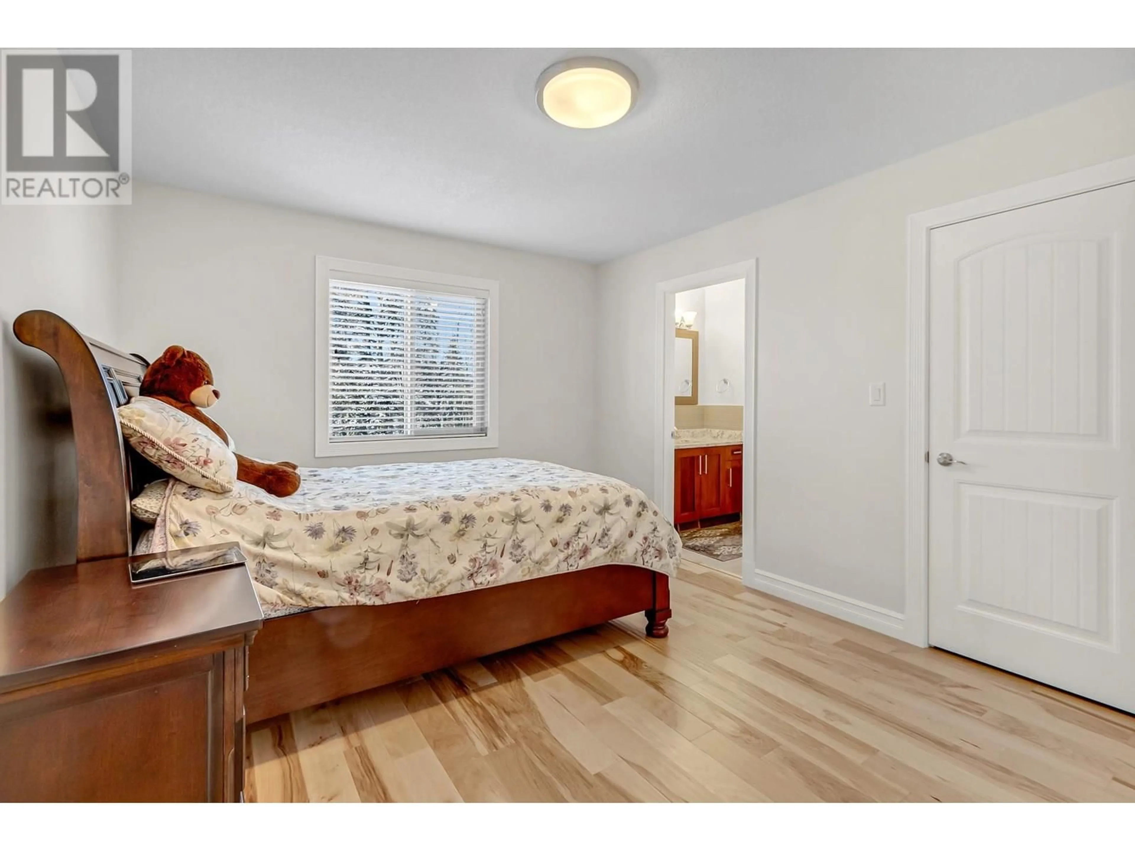 Bedroom with bed, wood/laminate floor for 3228 PARKVIEW CRESCENT, Prince George British Columbia V2N0E7