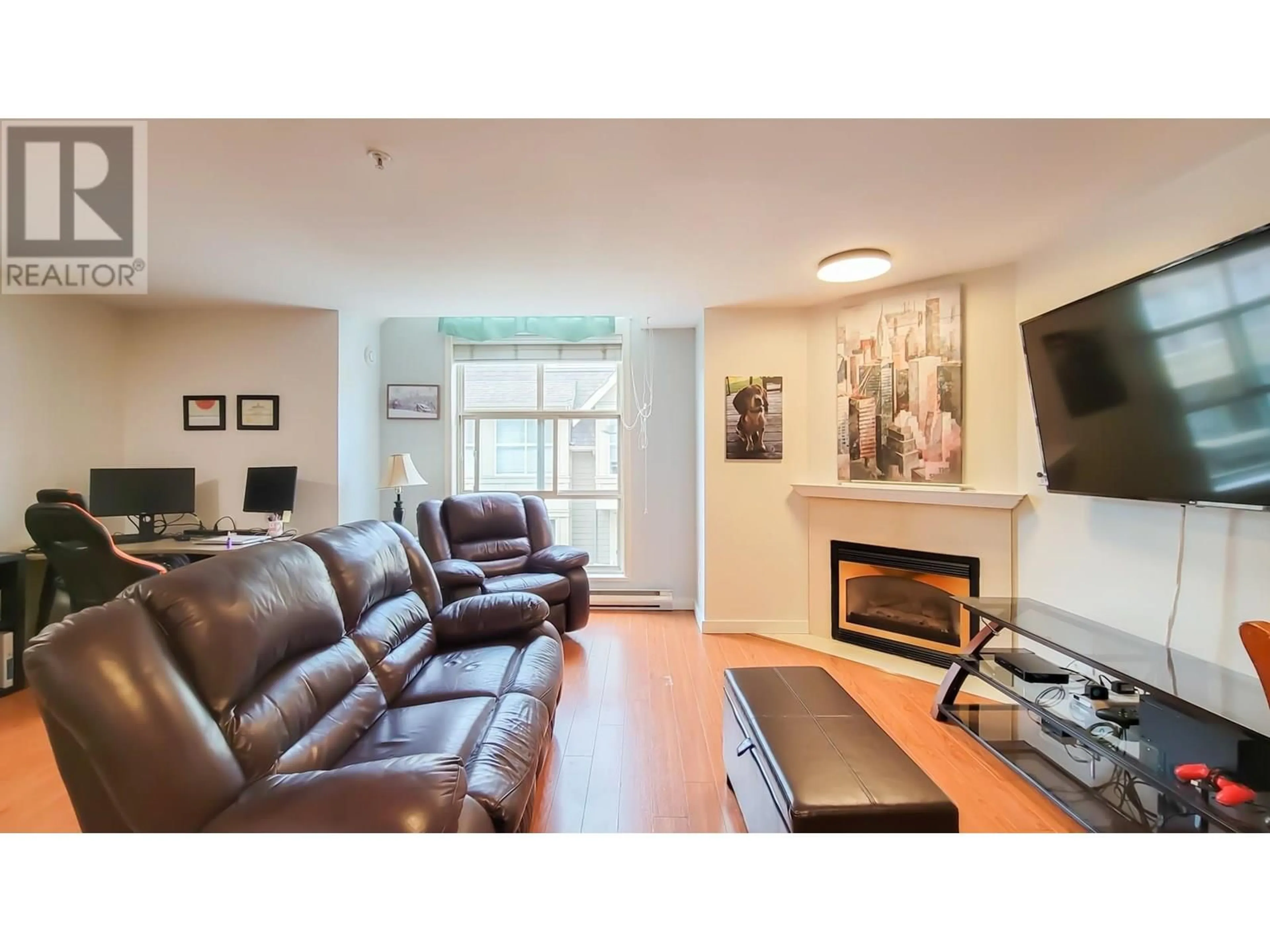 Living room with furniture, wood/laminate floor for 21 - 2378 RINDALL AVENUE, Port Coquitlam British Columbia V3C1V2