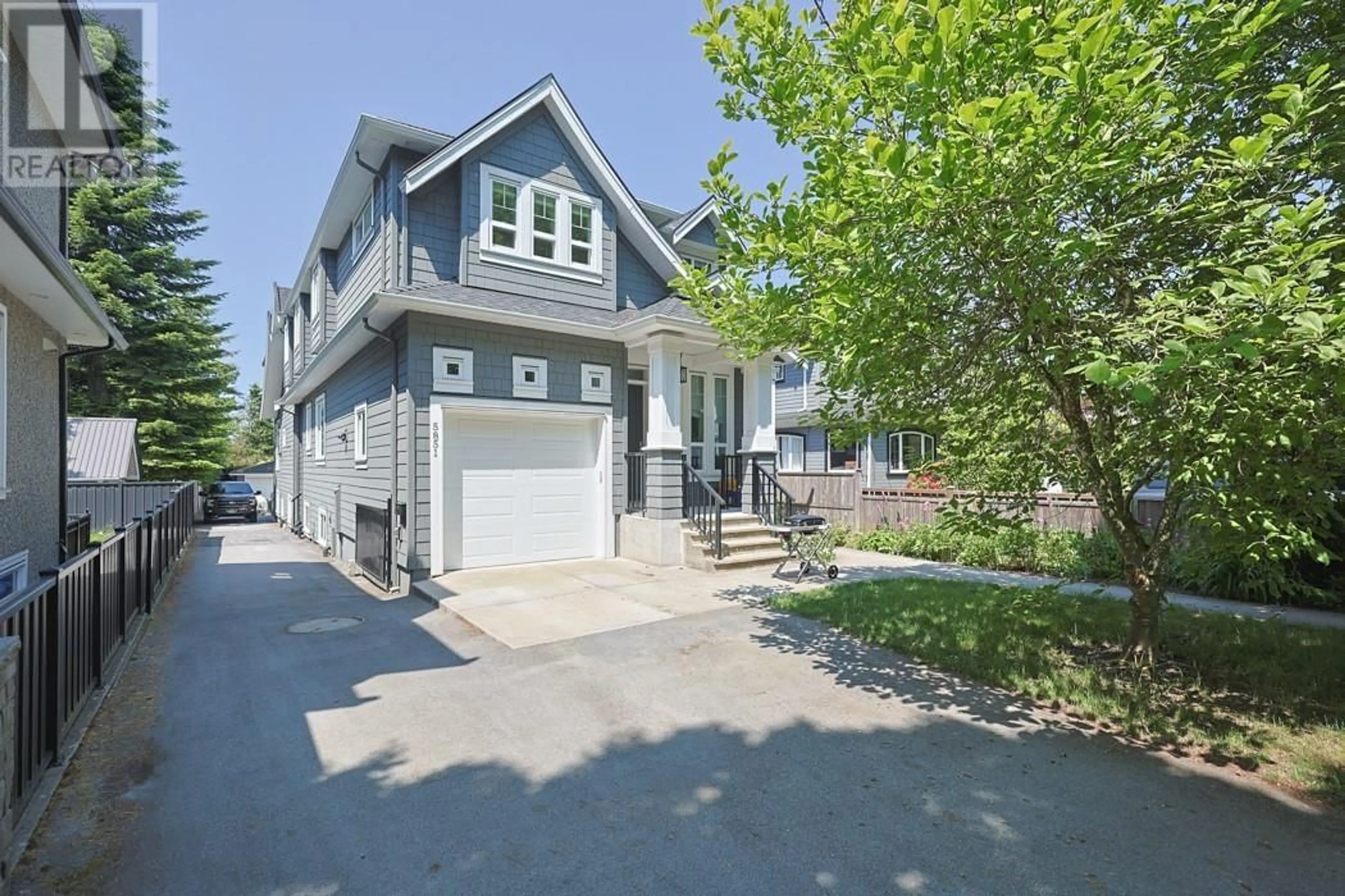 Home with vinyl exterior material, street for 5855 ST. GEORGE STREET, Vancouver British Columbia V5W2Y4