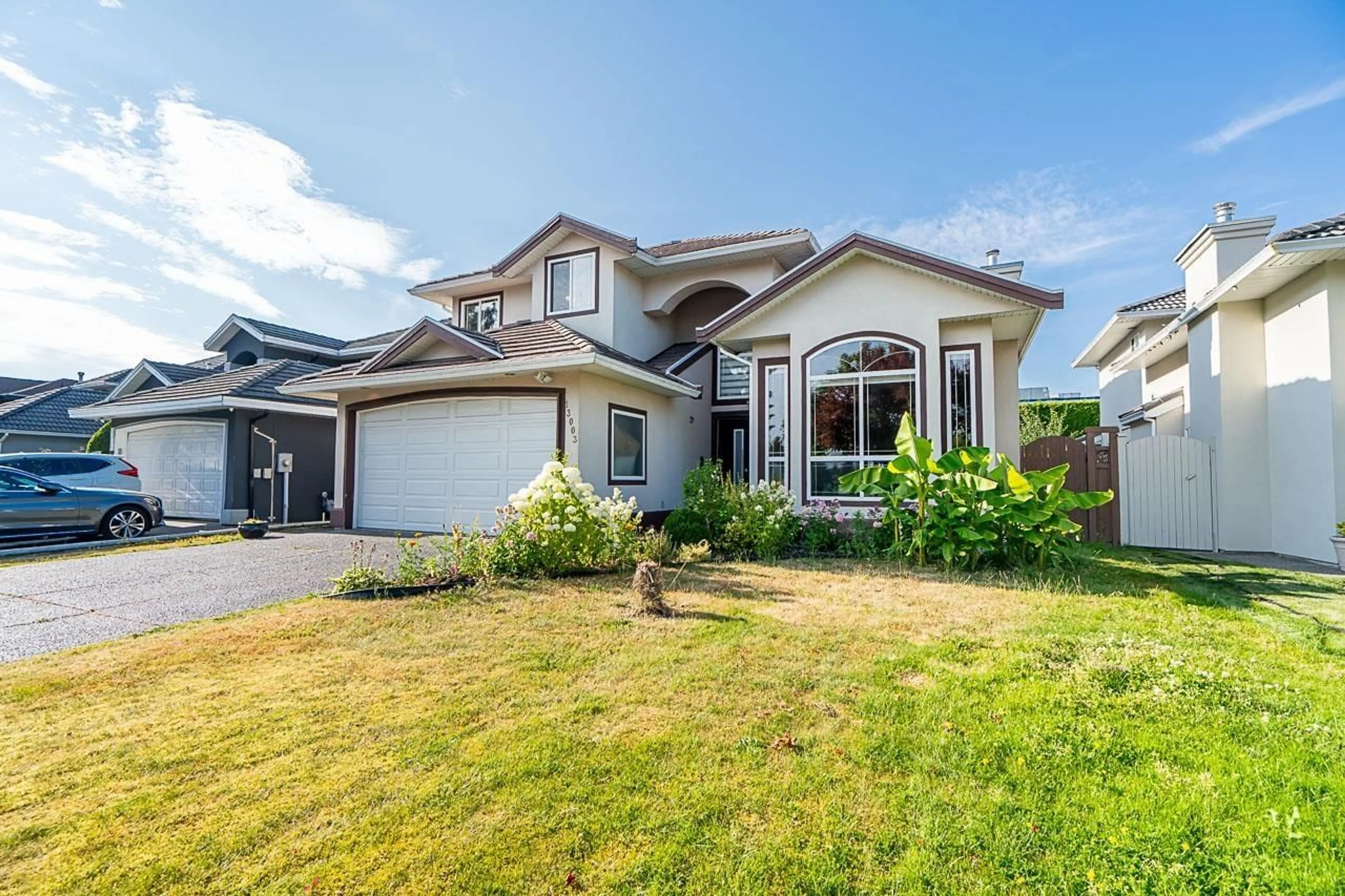 Home with vinyl exterior material, street for 13003 74, Surrey British Columbia V3W1C3