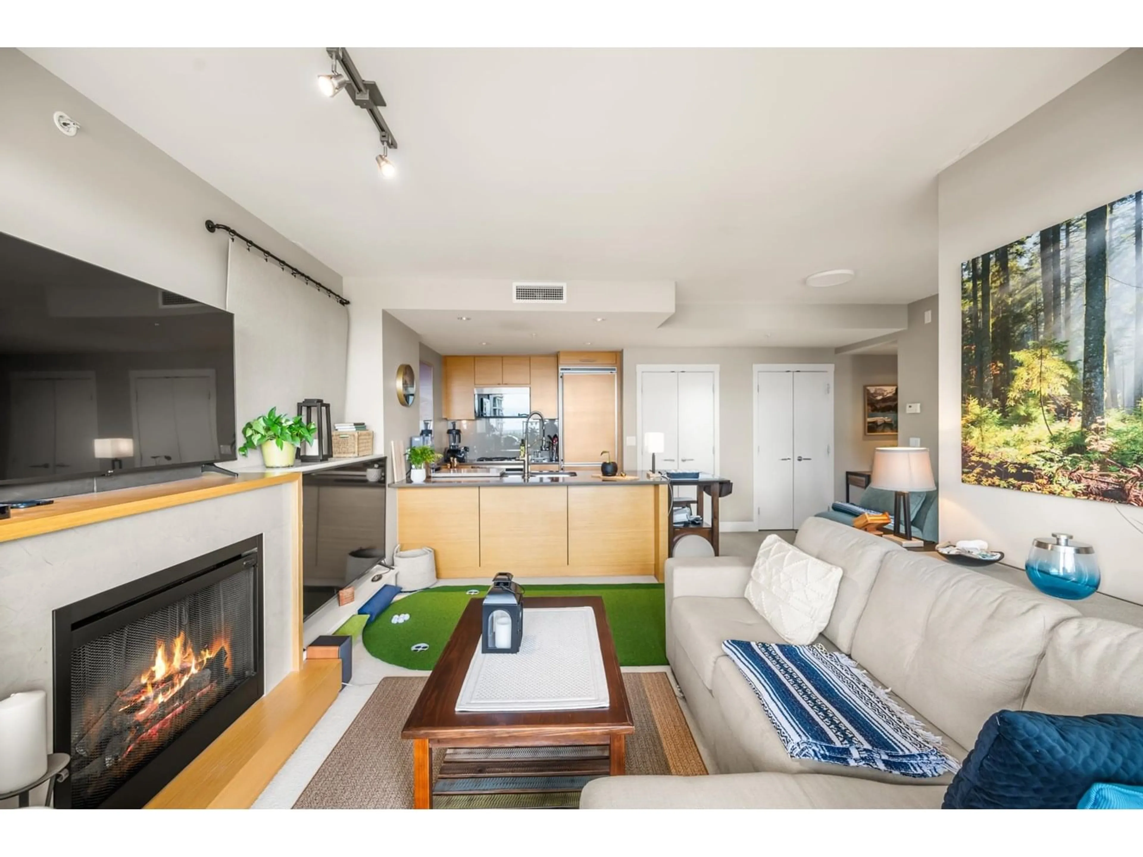 Living room with furniture, wood/laminate floor for 807 - 1473 JOHNSTON, Surrey British Columbia V4B0A2