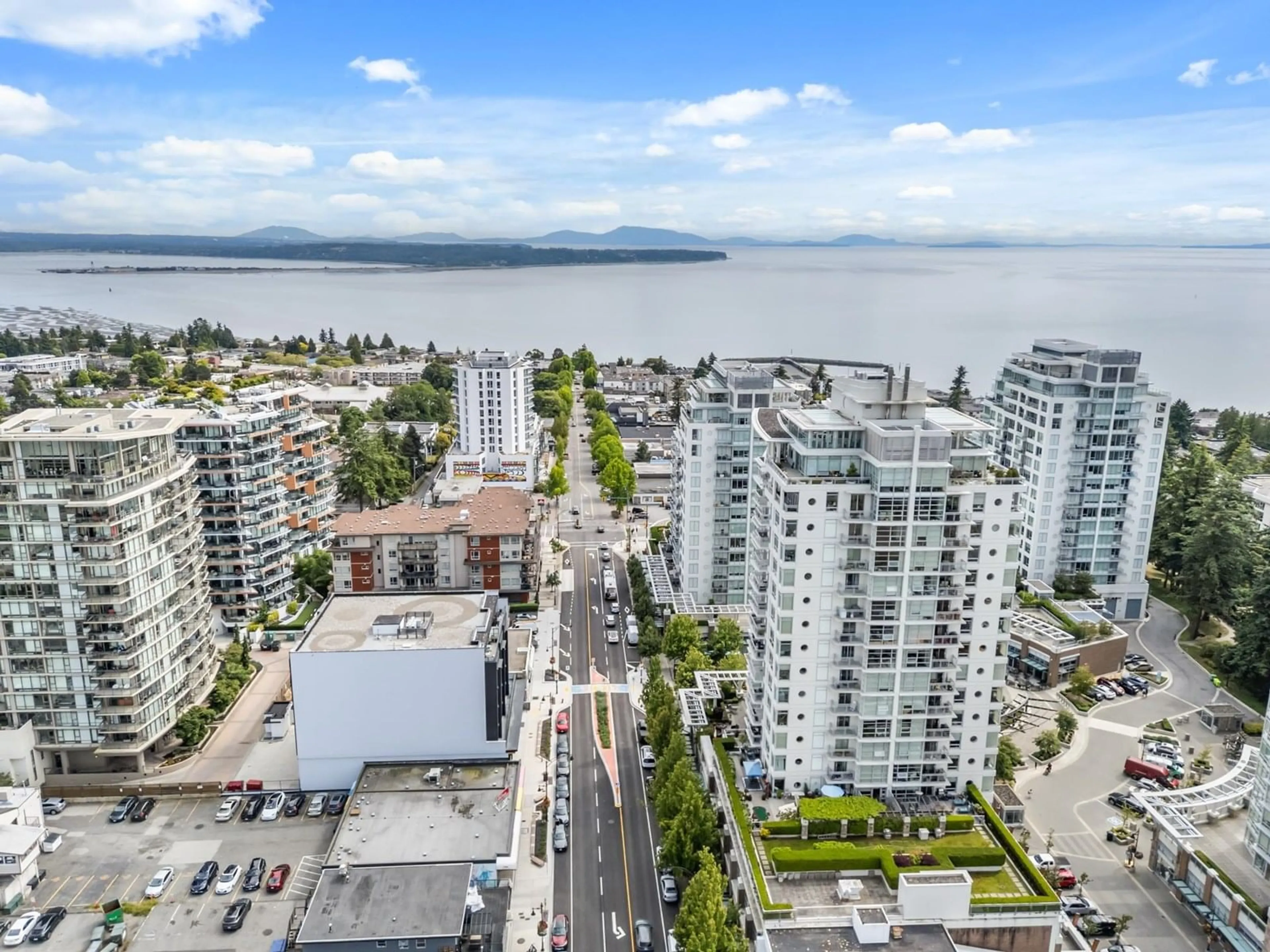 A pic from outside/outdoor area/front of a property/back of a property/a pic from drone, water/lake/river/ocean view for 807 - 1473 JOHNSTON, Surrey British Columbia V4B0A2
