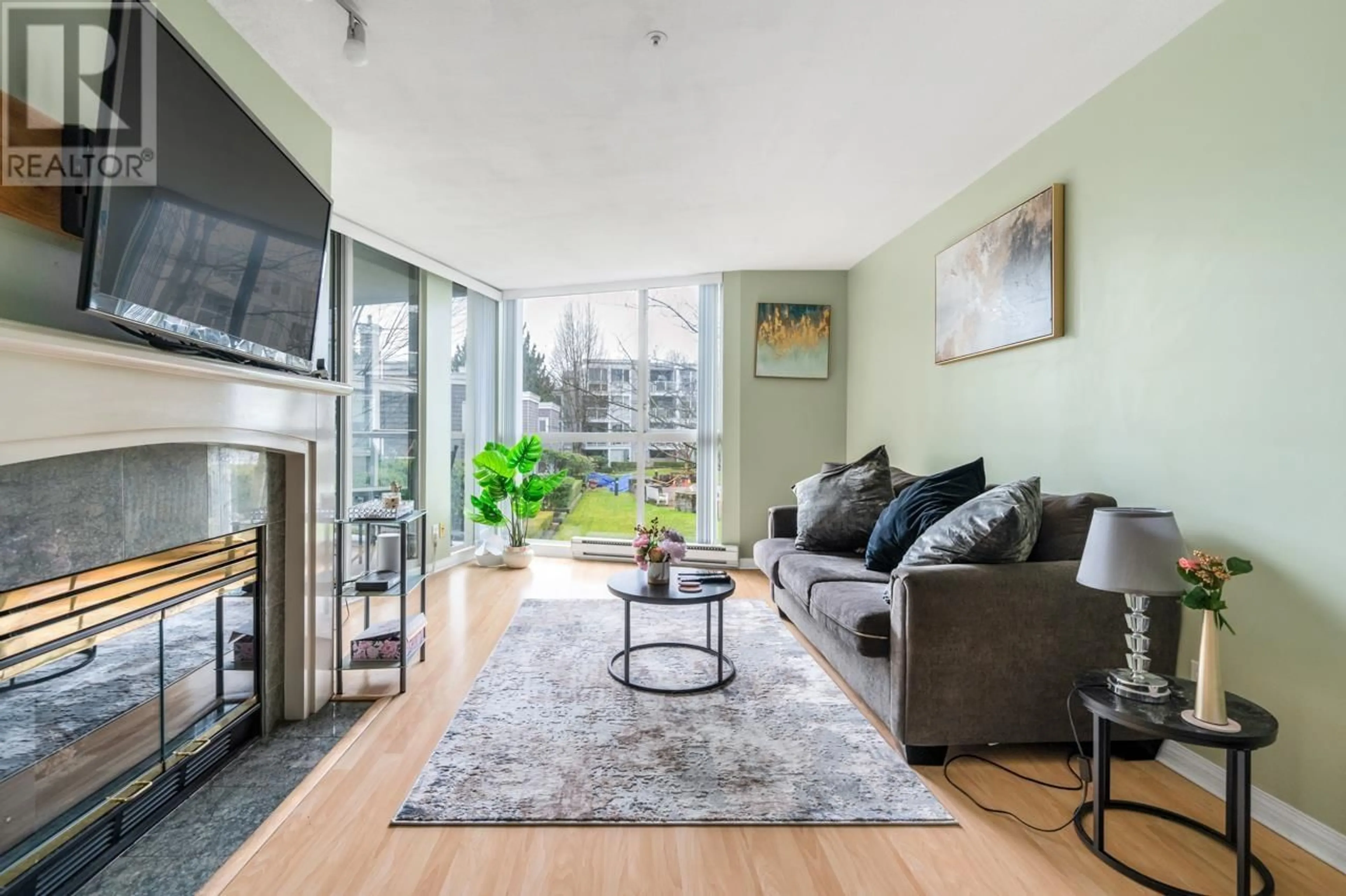 Living room with furniture, unknown for 207 - 8450 JELLICOE STREET, Vancouver British Columbia V5S4S9