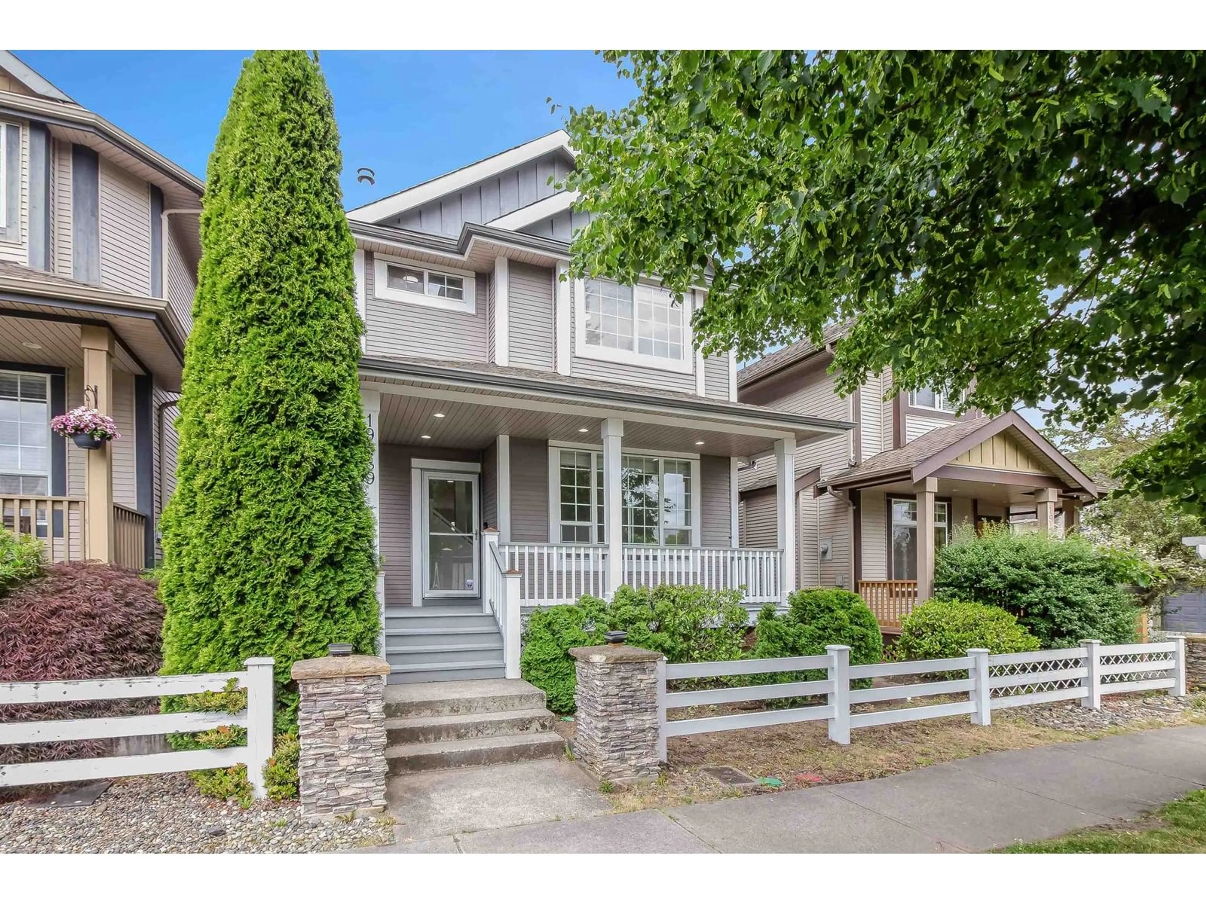 Home with vinyl exterior material, street for 19489 66, Surrey British Columbia V4N0C3