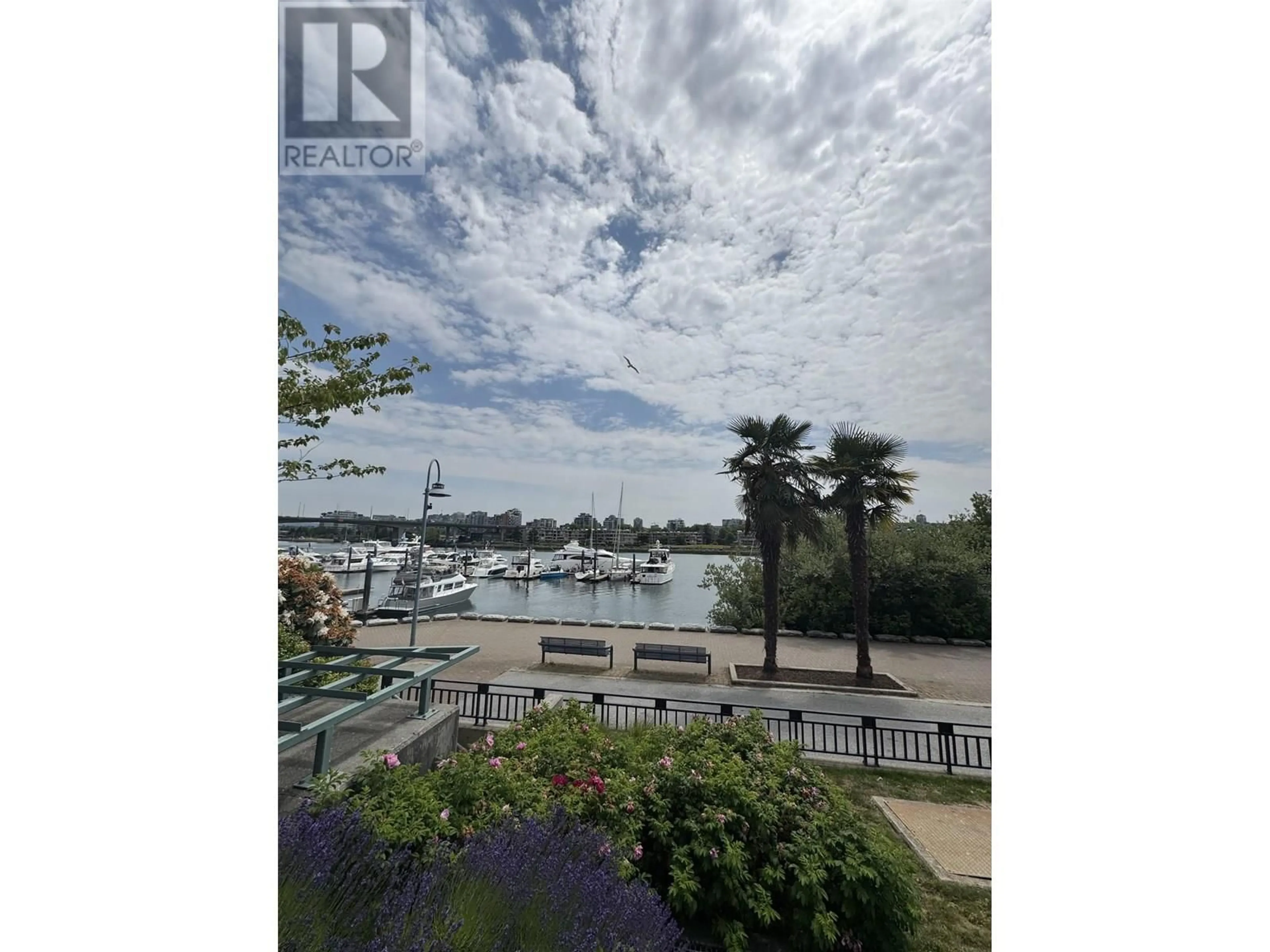Patio, water/lake/river/ocean view for 122 - 1228 MARINASIDE CRESCENT, Vancouver British Columbia V6Z2W4
