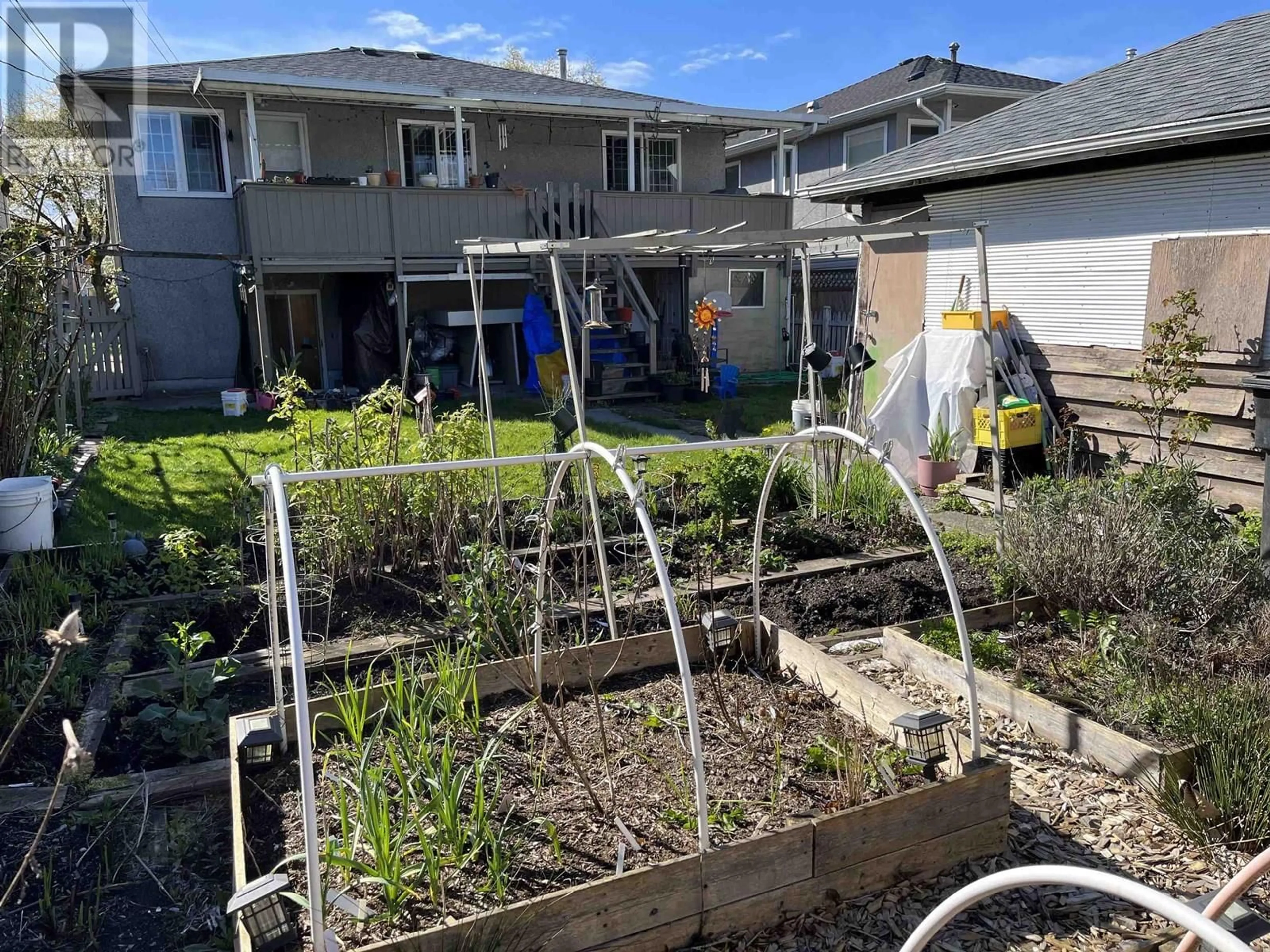 A pic from outside/outdoor area/front of a property/back of a property/a pic from drone, street for 5848 CULLODEN STREET, Vancouver British Columbia V5W3S2