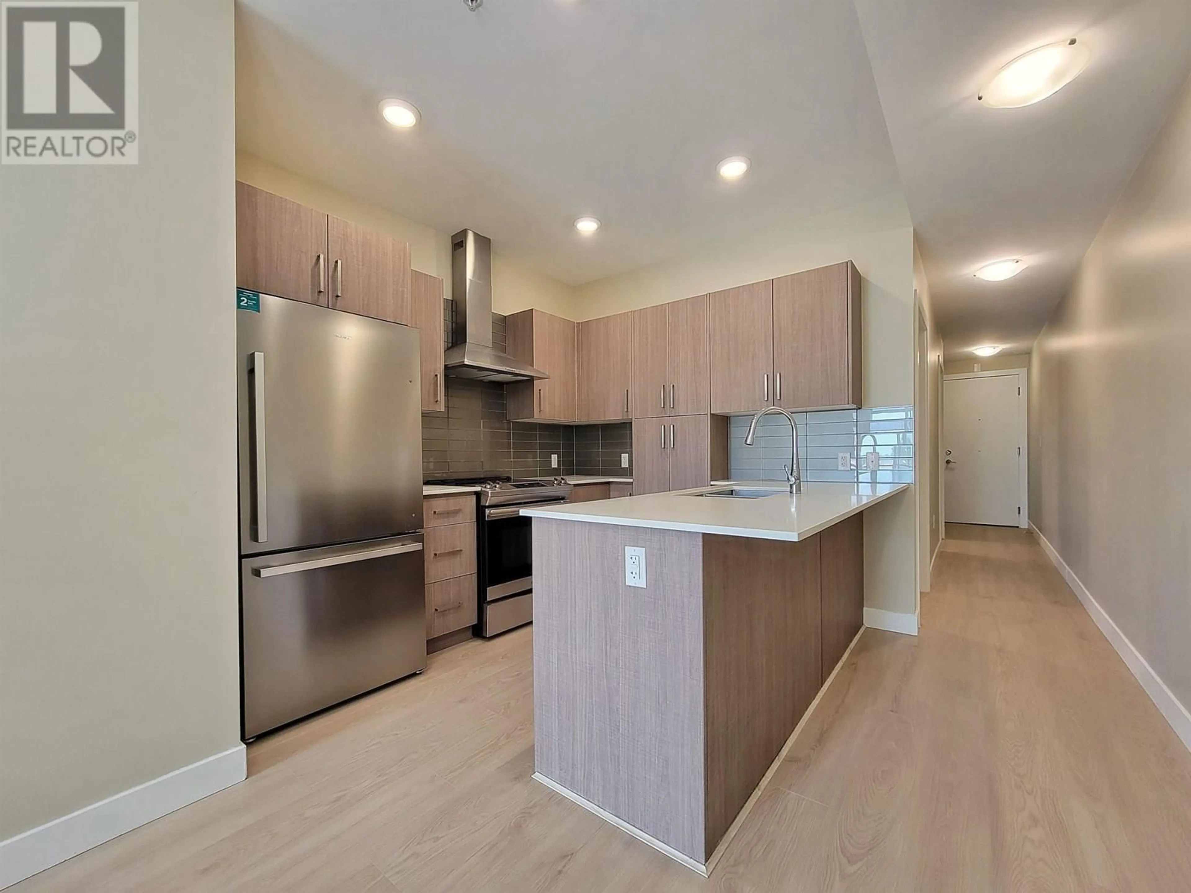 Open concept kitchen, unknown for 308 - 2889 1ST AVENUE, Vancouver British Columbia V5M0G2