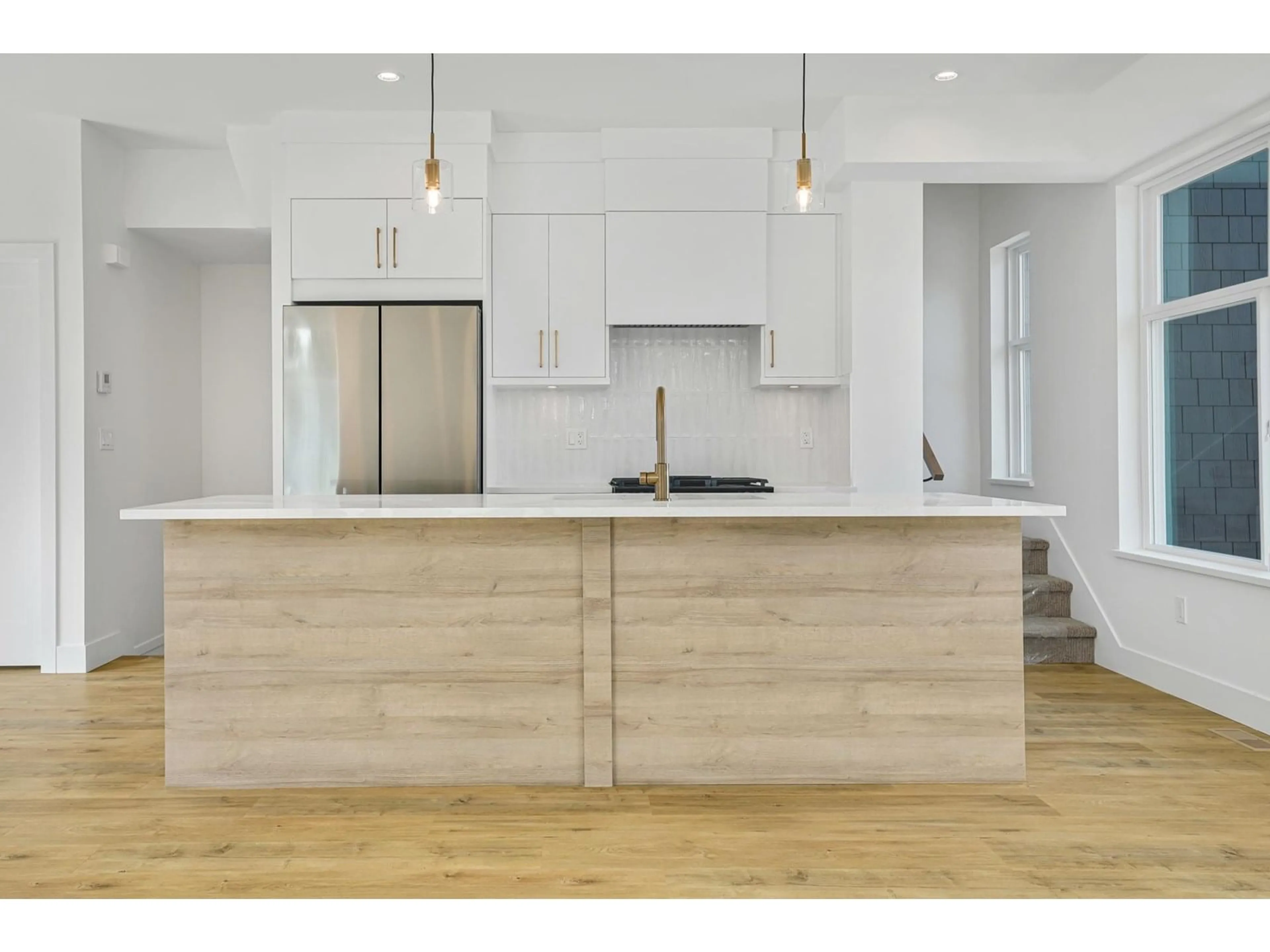 Open concept kitchen, wood/laminate floor for 7 - 12770 105, Surrey British Columbia V3V0H2