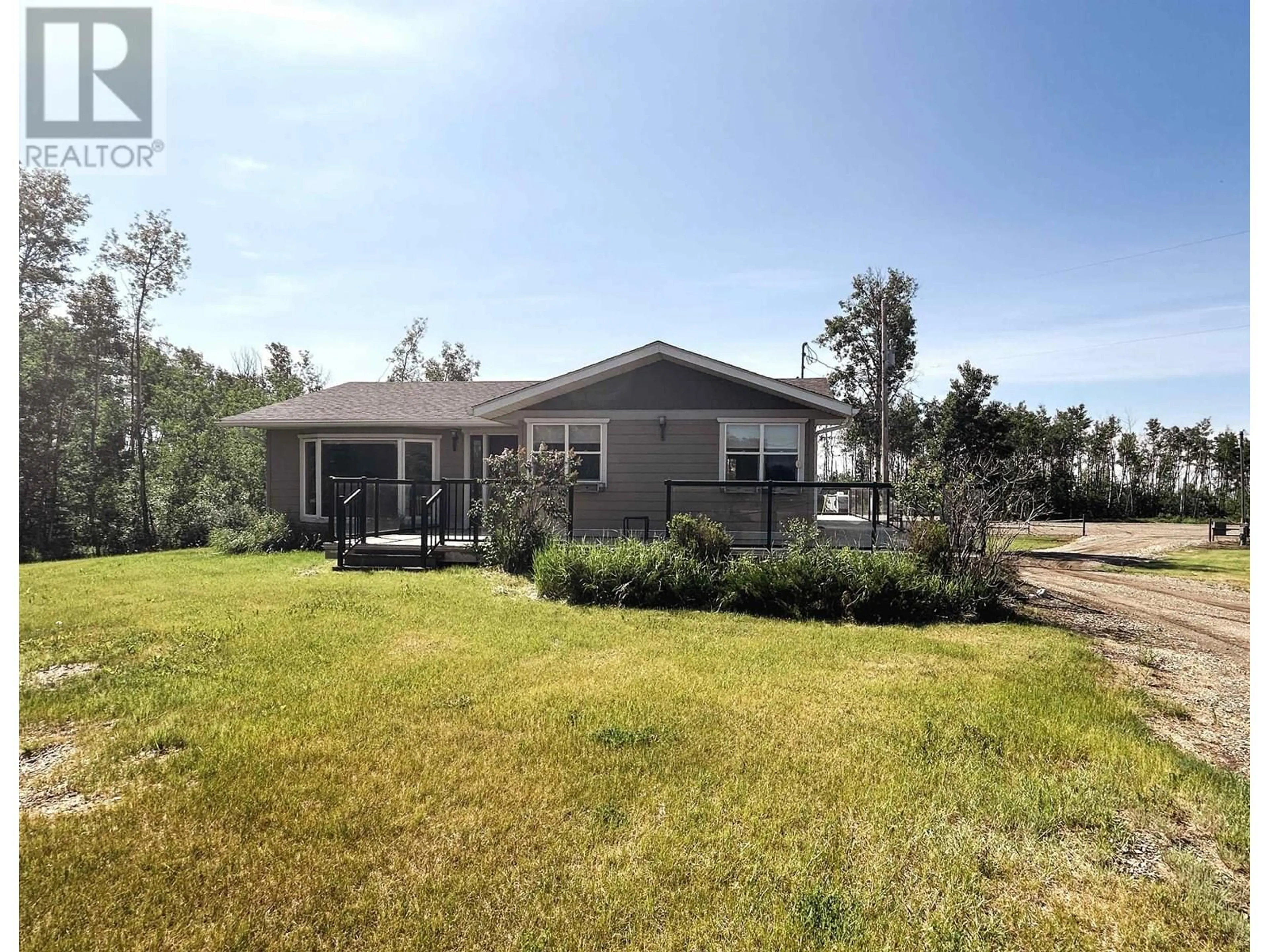 A pic from outside/outdoor area/front of a property/back of a property/a pic from drone, water/lake/river/ocean view for 6816 97 HIGHWAY, Fort St. John British Columbia V1J4H8