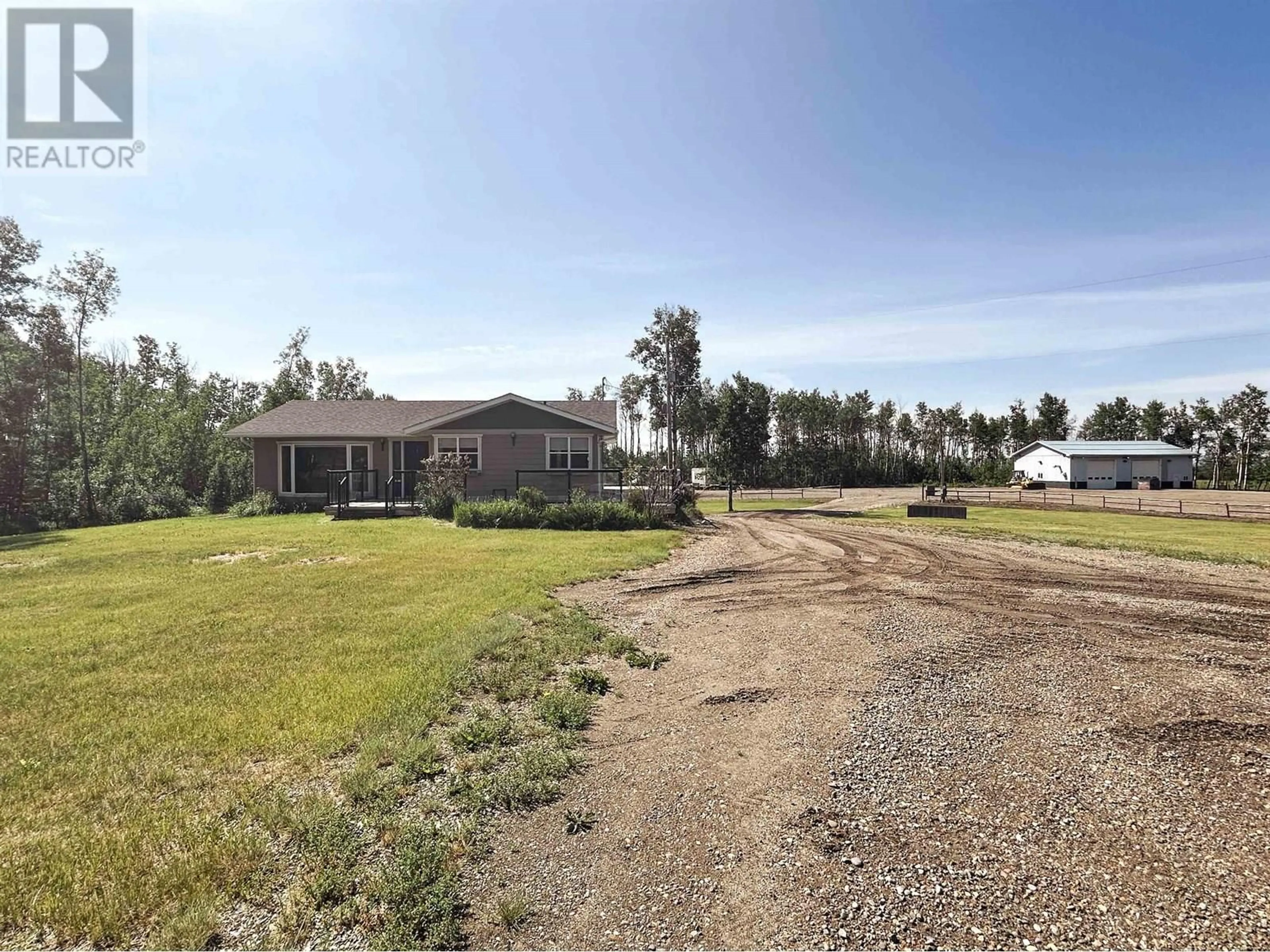 A pic from outside/outdoor area/front of a property/back of a property/a pic from drone, unknown for 6816 97 HIGHWAY, Fort St. John British Columbia V1J4H8