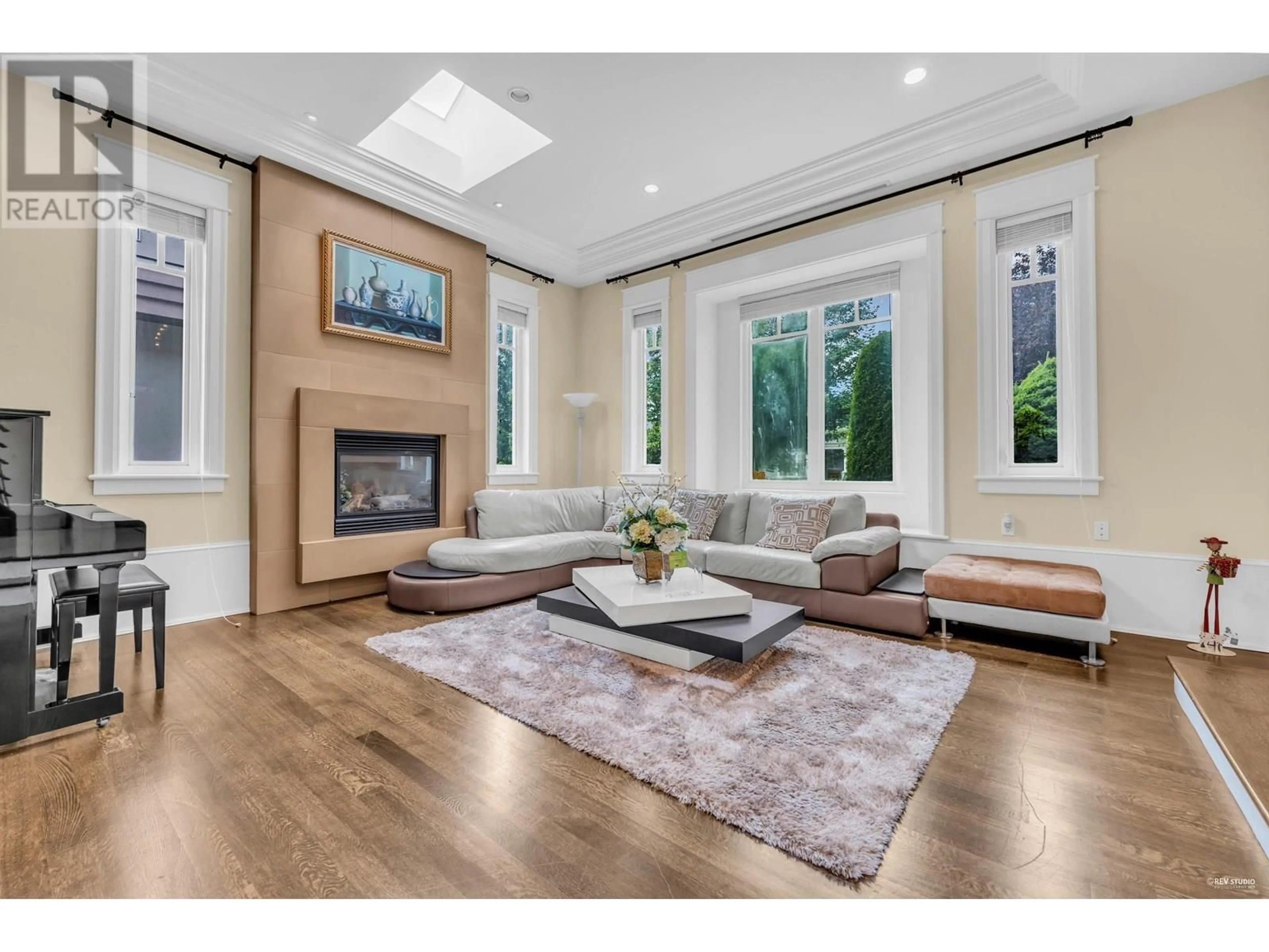 Living room with furniture, wood/laminate floor for 6562 FREMLIN STREET, Vancouver British Columbia V6P3W1