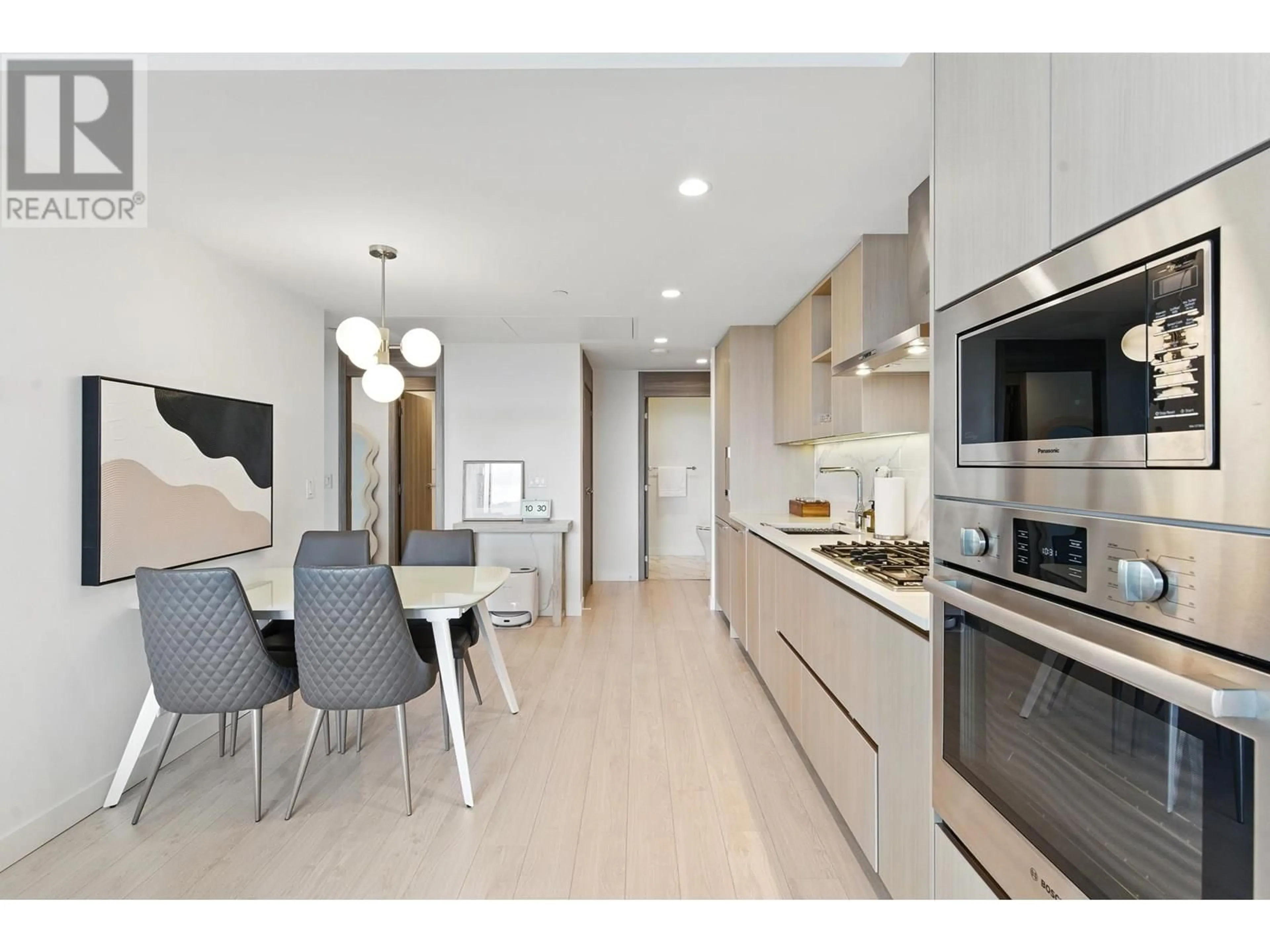 Open concept kitchen, wood/laminate floor for 2007 - 4880 LOUGHEED HIGHWAY, Burnaby British Columbia V5C0N1