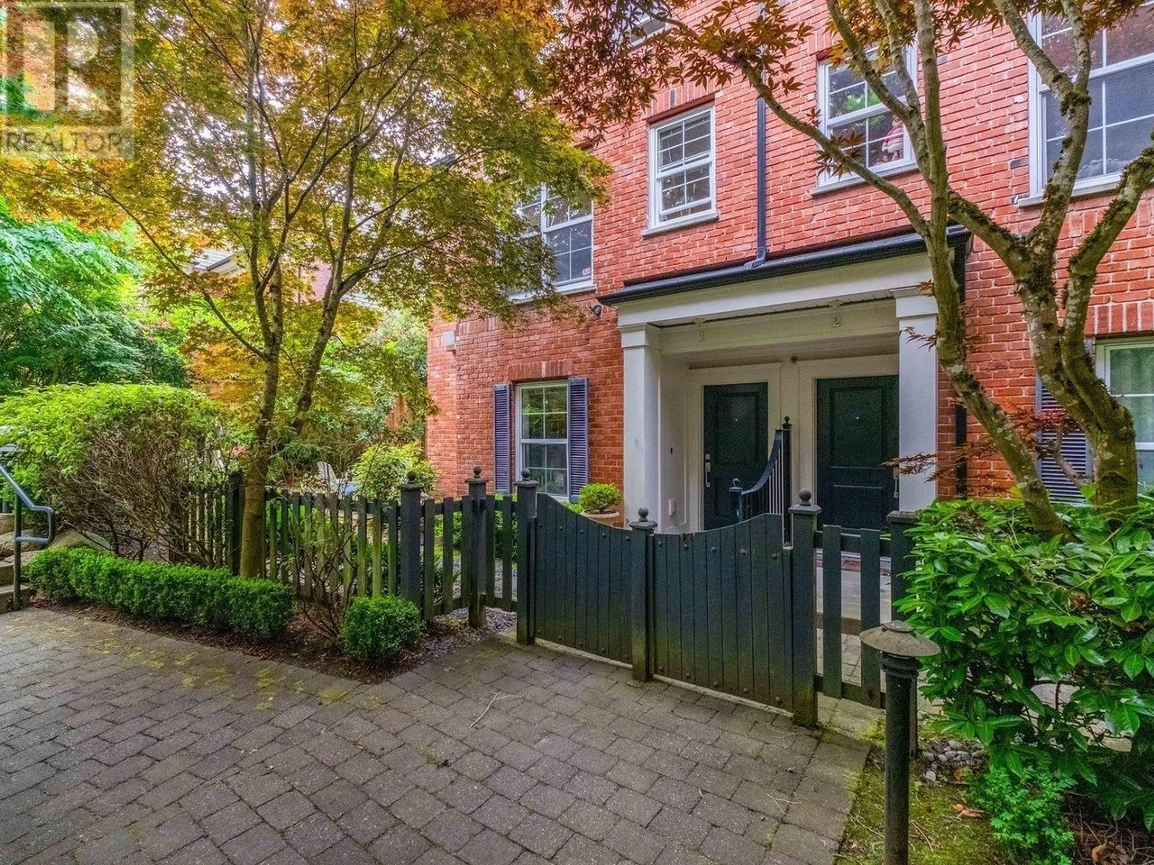 A pic from outside/outdoor area/front of a property/back of a property/a pic from drone, street for 1 - 5808 TISDALL STREET, Vancouver British Columbia V5Z3N2