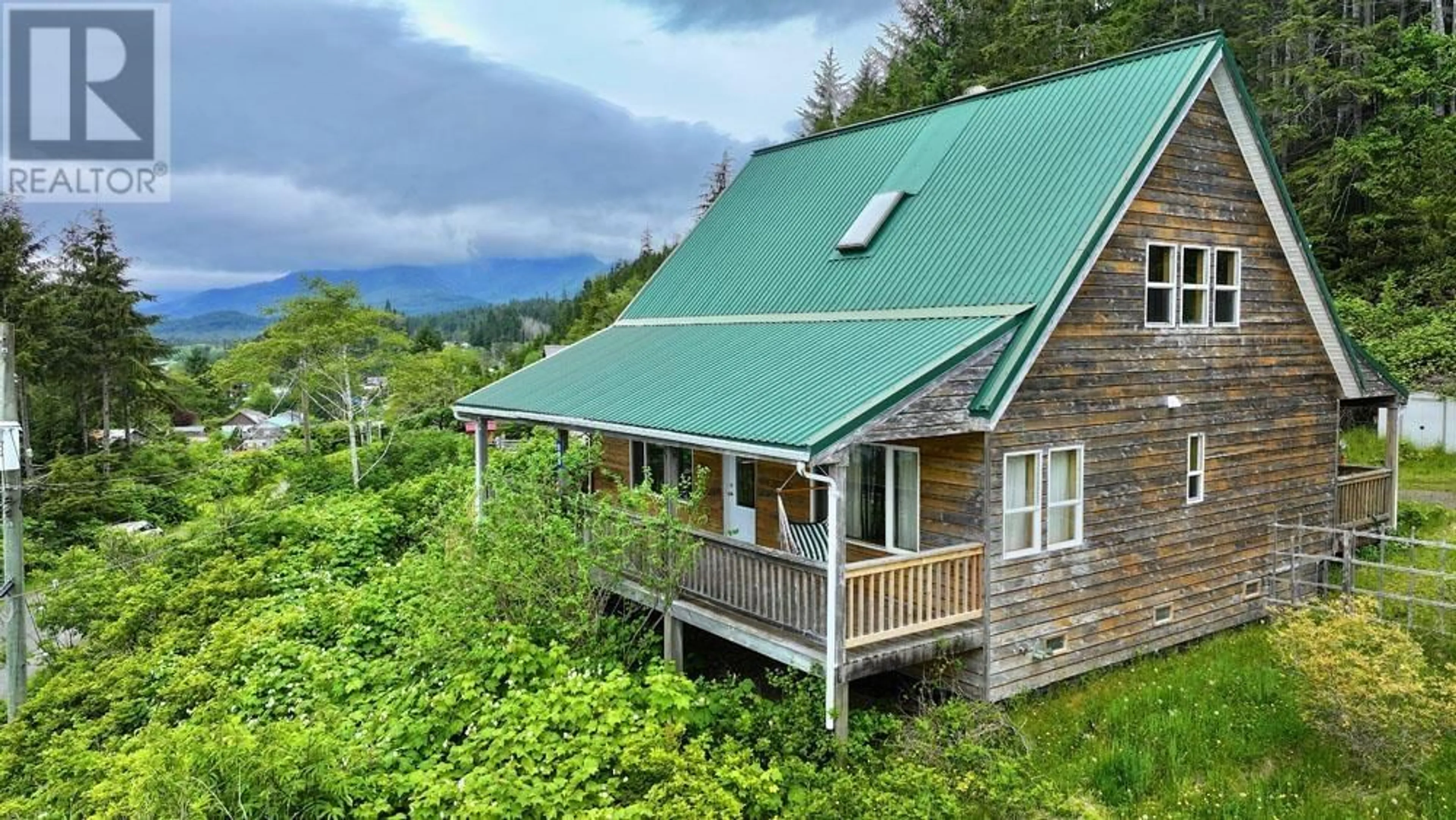 A pic from outside/outdoor area/front of a property/back of a property/a pic from drone, mountain view for 209 2ND AVENUE, Daajing Giids City British Columbia V0T1S0