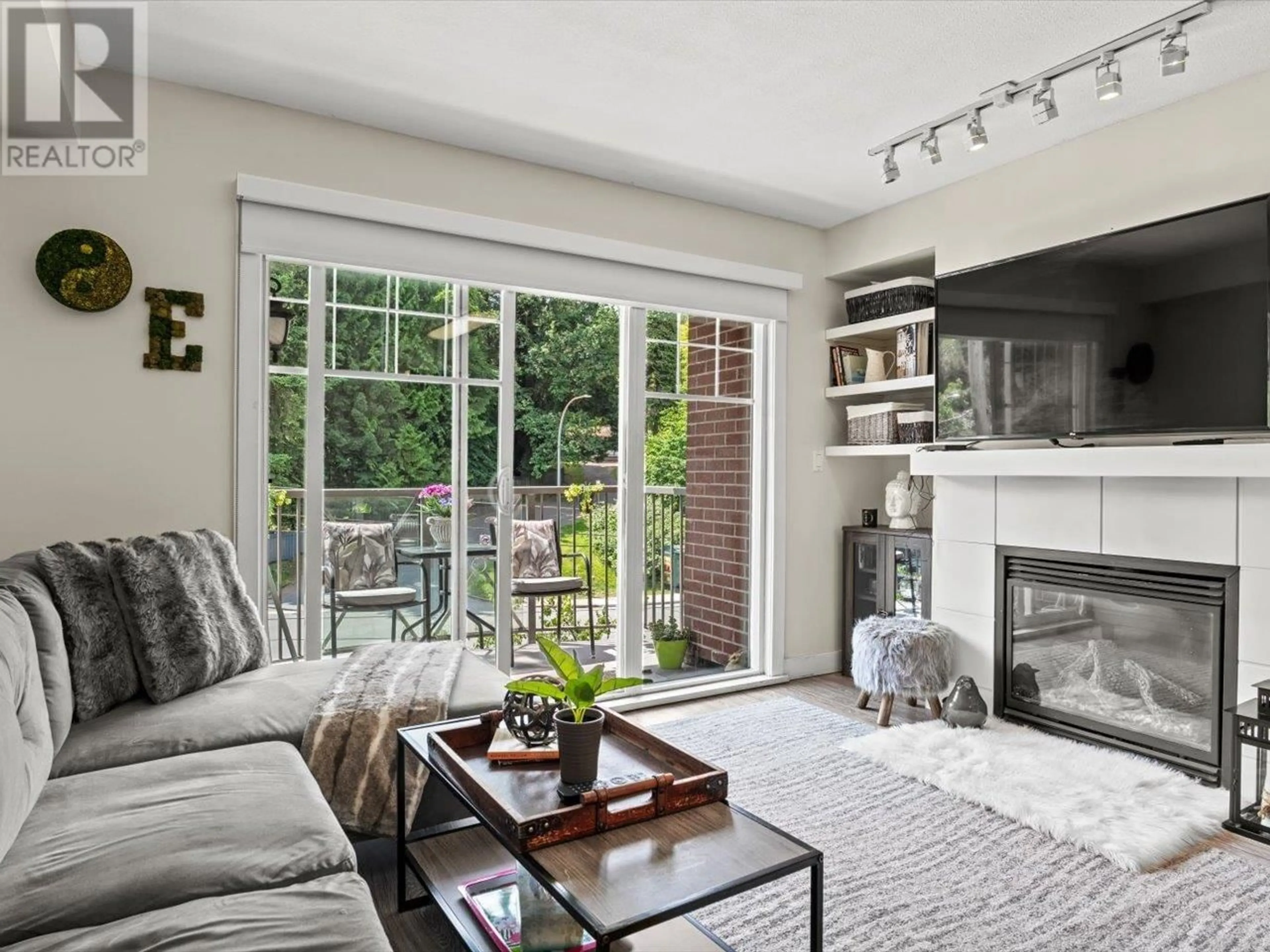 Living room with furniture, unknown for 303 - 3260 ST JOHNS STREET, Port Moody British Columbia V3H0B9