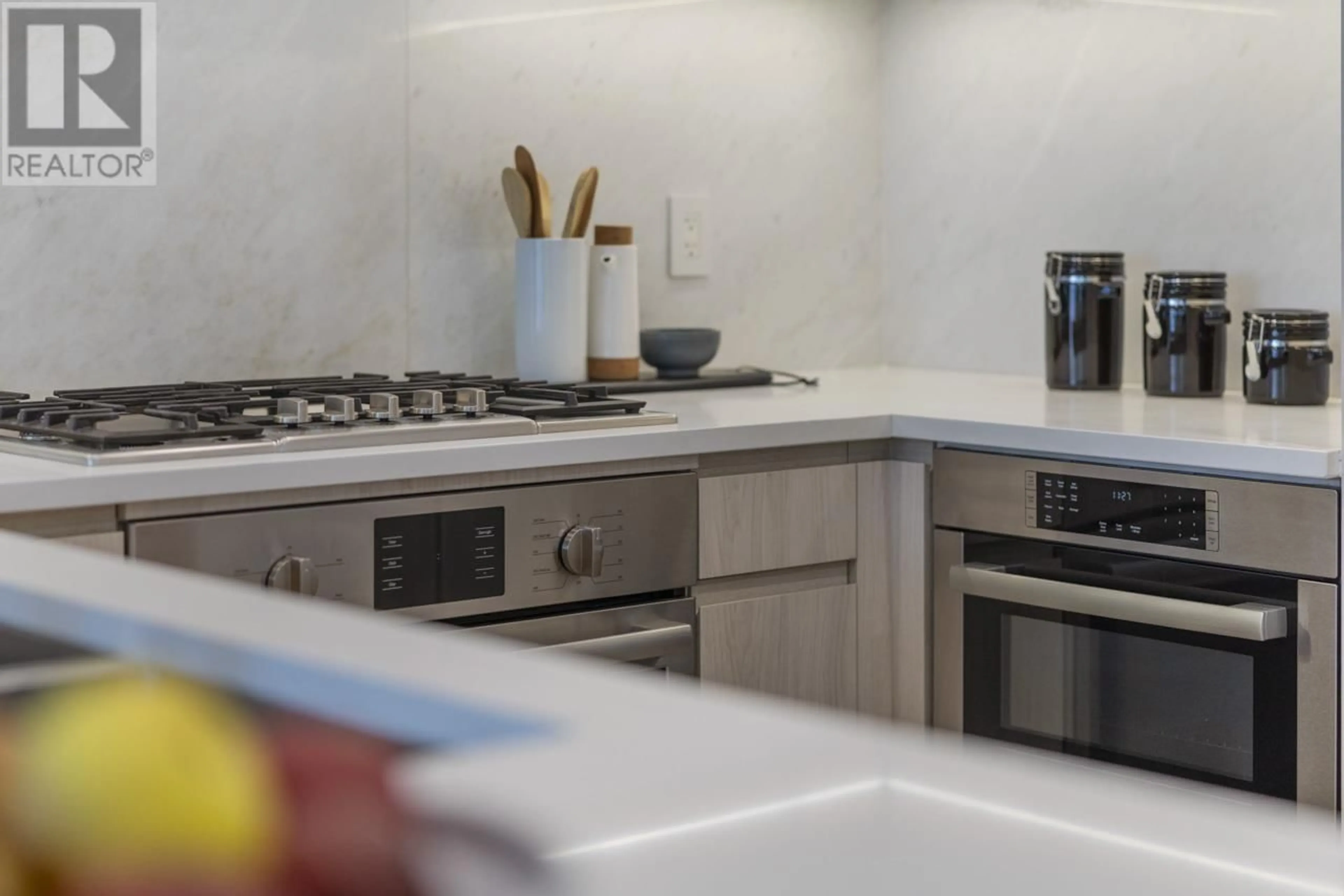 Standard kitchen, ceramic/tile floor for 309 - 177 3RD STREET, North Vancouver British Columbia V7M0G5