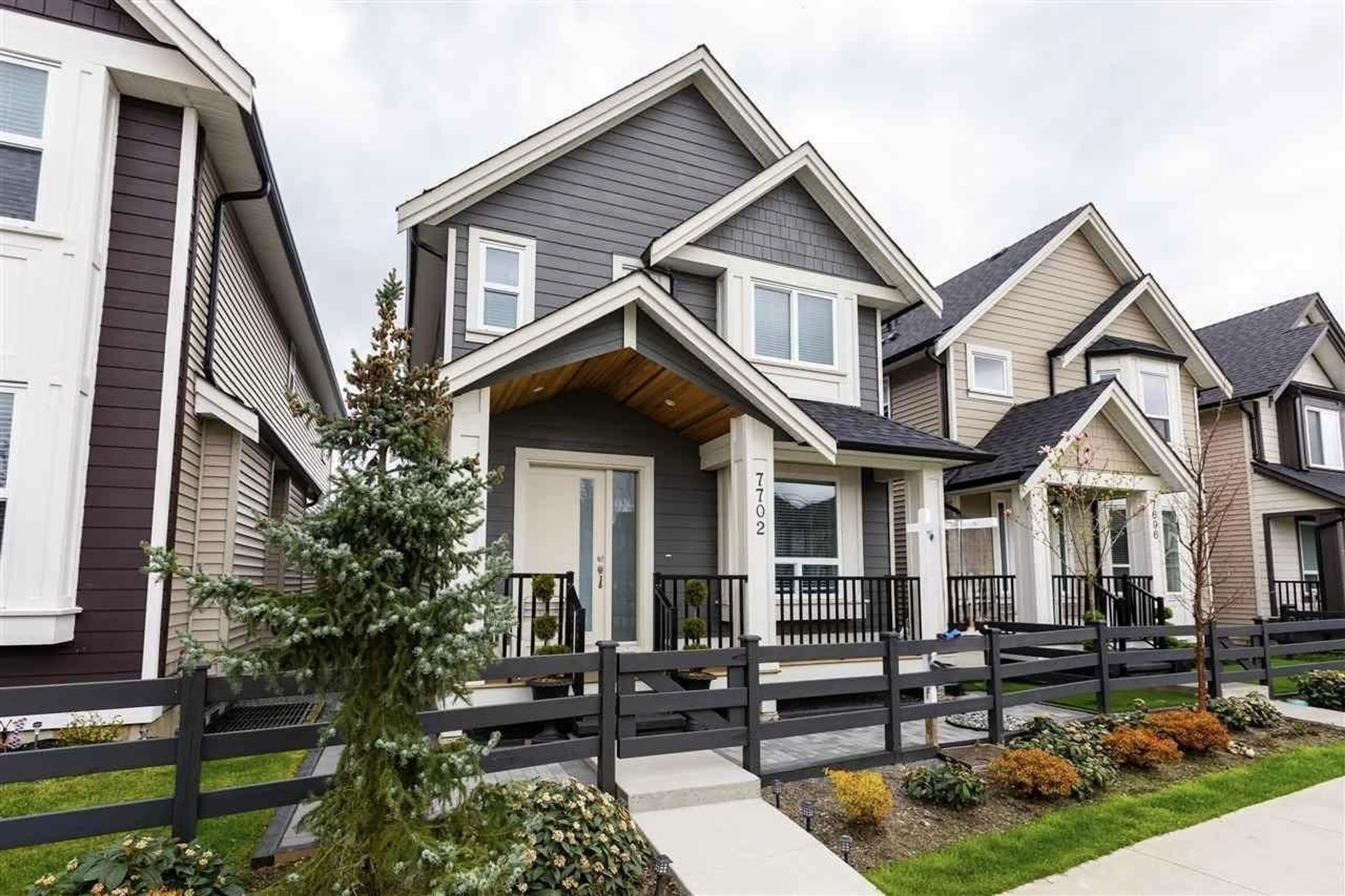 Home with vinyl exterior material, street for 7702 211, Langley British Columbia V2Y0W5