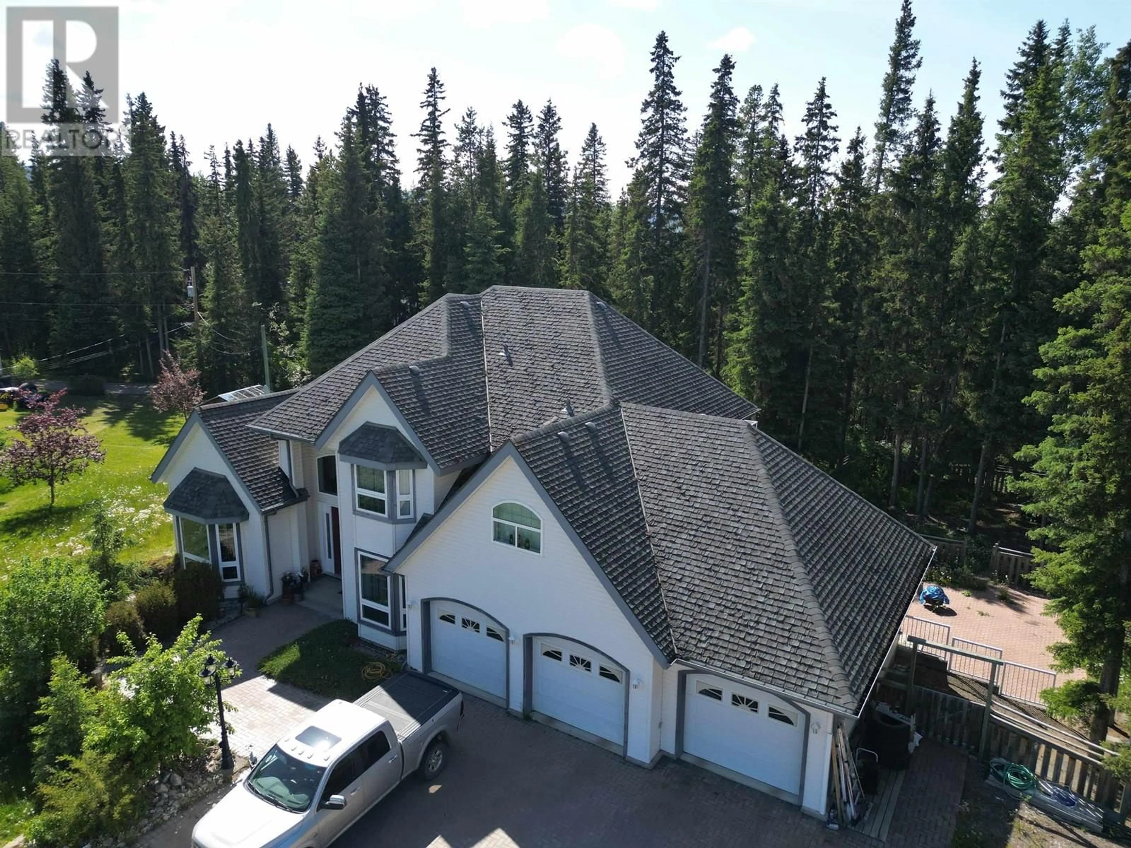 A pic from outside/outdoor area/front of a property/back of a property/a pic from drone, mountain view for 585 5TH AVENUE, Burns Lake British Columbia V0J1E0