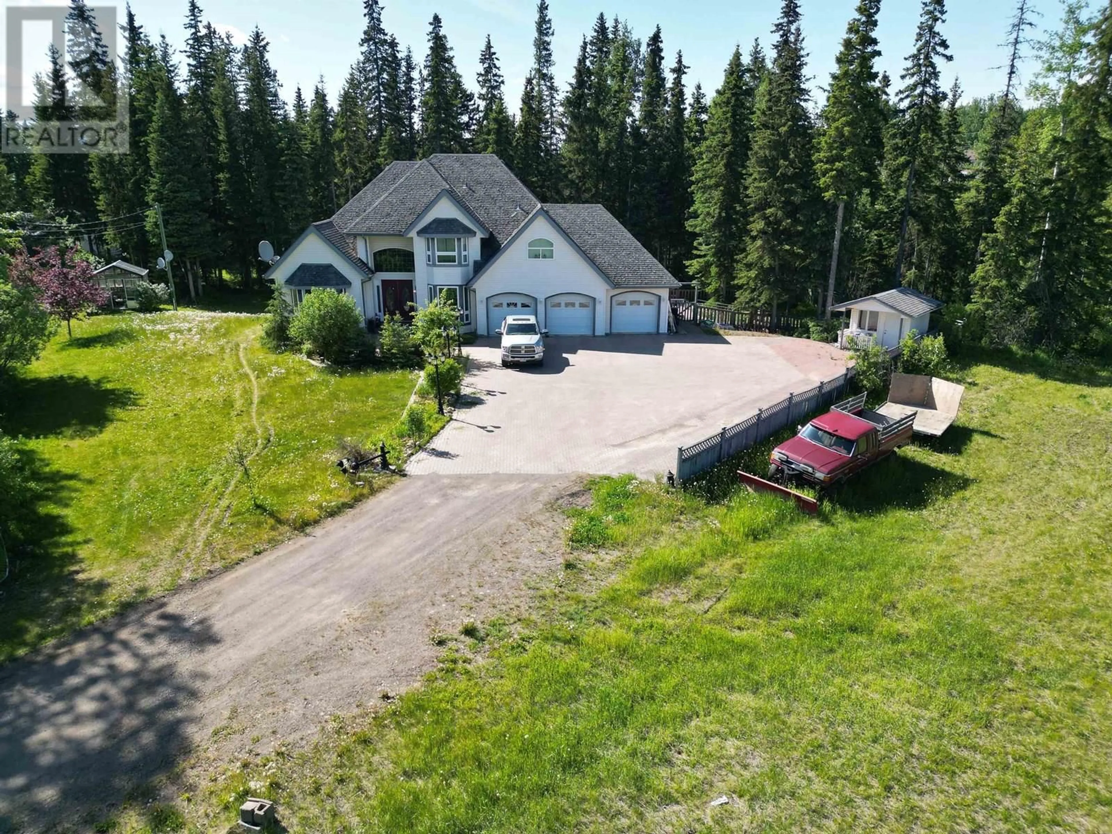 A pic from outside/outdoor area/front of a property/back of a property/a pic from drone, mountain view for 585 5TH AVENUE, Burns Lake British Columbia V0J1E0