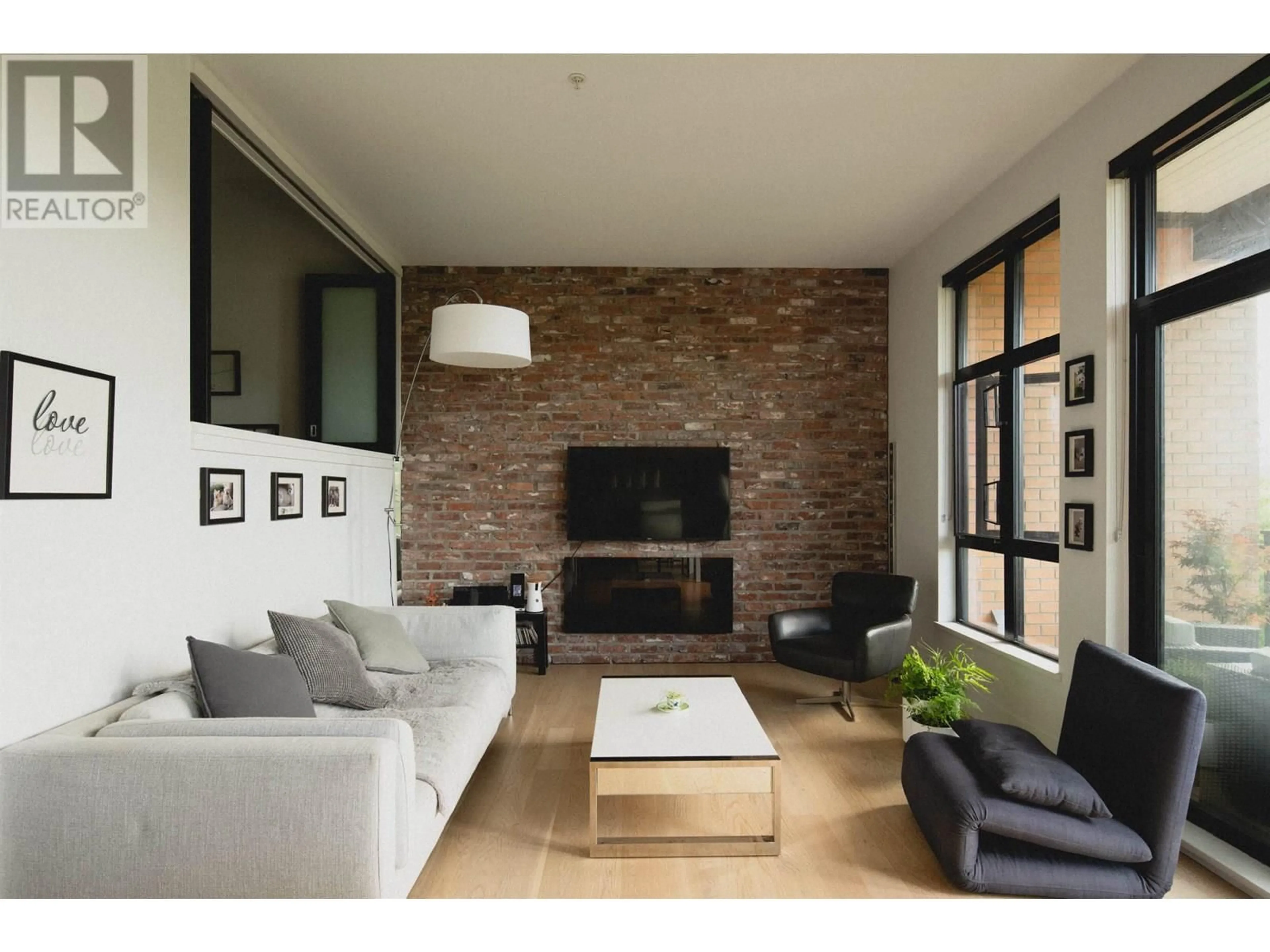 Living room with furniture, unknown for 303 - 220 SALTER STREET, New Westminster British Columbia V3M0H4