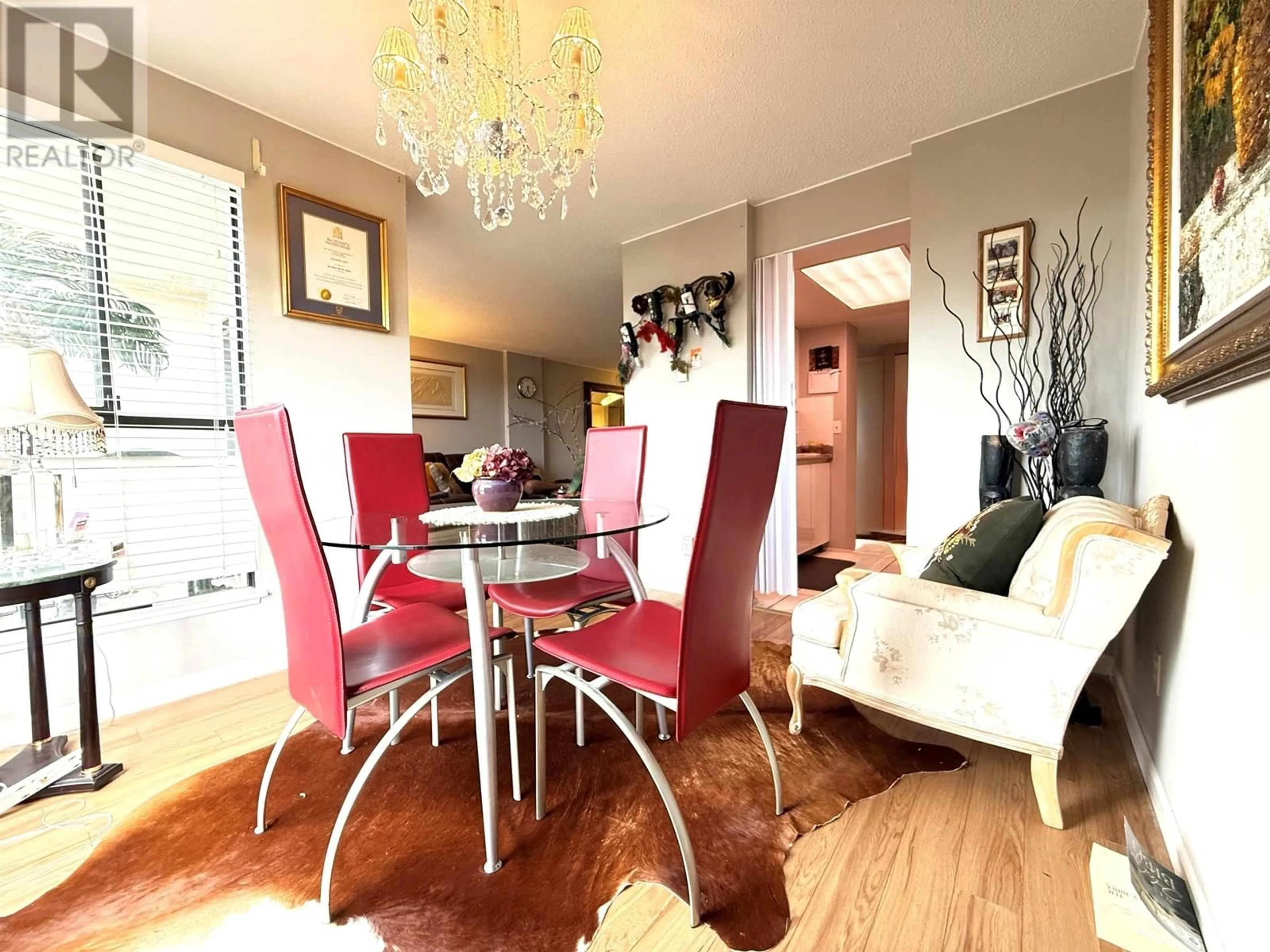 Dining room, wood/laminate floor for 703 - 7040 GRANVILLE AVENUE, Richmond British Columbia V6Y3W5