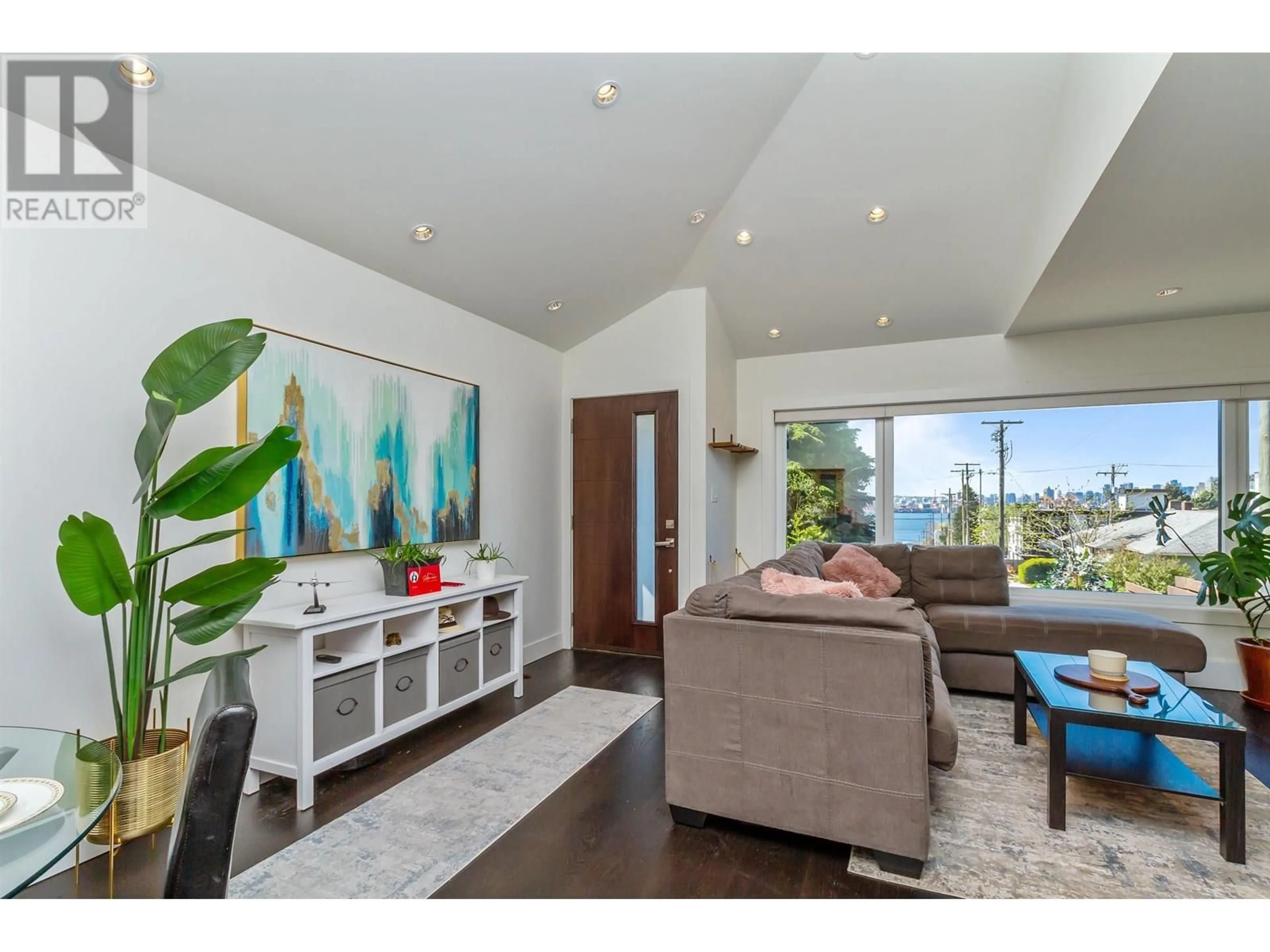 Living room with furniture, wood/laminate floor for 384 4TH STREET, North Vancouver British Columbia V7L1J2