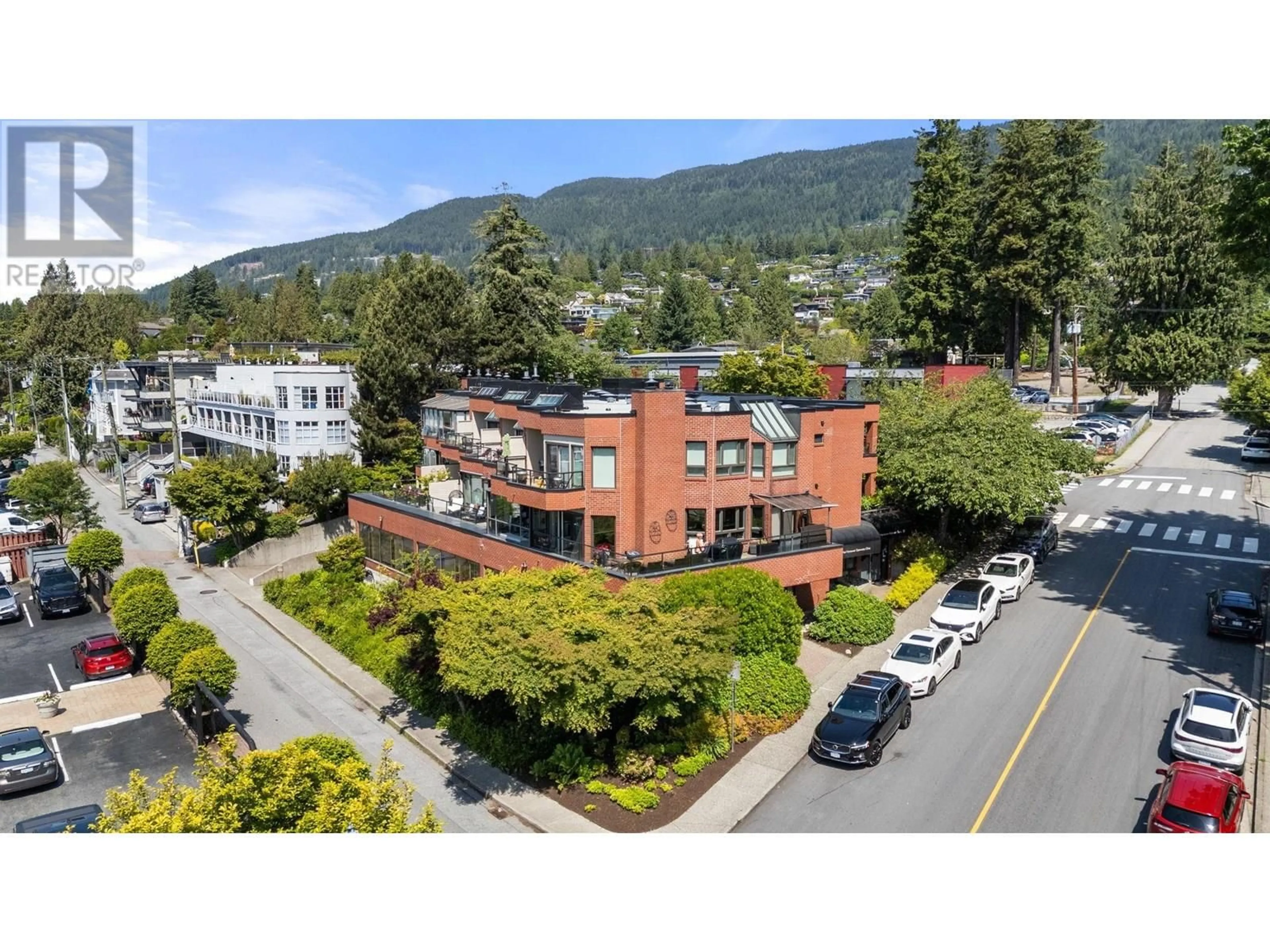 A pic from outside/outdoor area/front of a property/back of a property/a pic from drone, mountain view for 201 - 2408 HAYWOOD AVENUE, West Vancouver British Columbia V7V1Y1