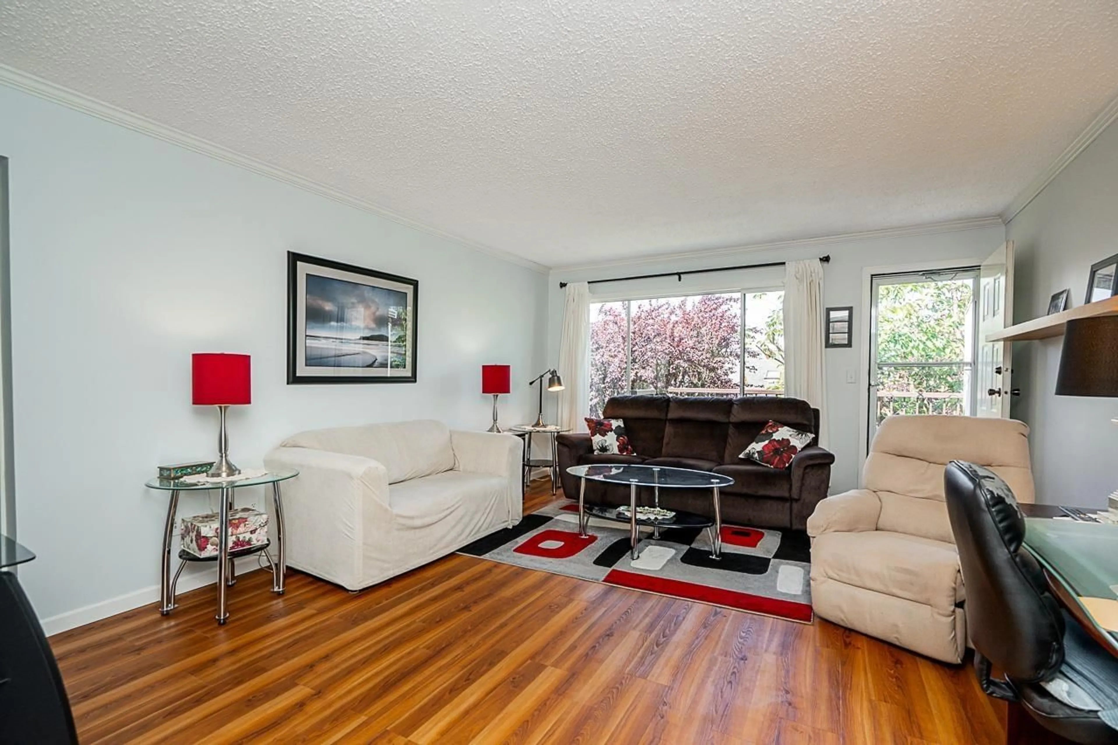 Living room with furniture, wood/laminate floor for 41 - 32959 GEORGE FERGUSON, Abbotsford British Columbia V2S7W9