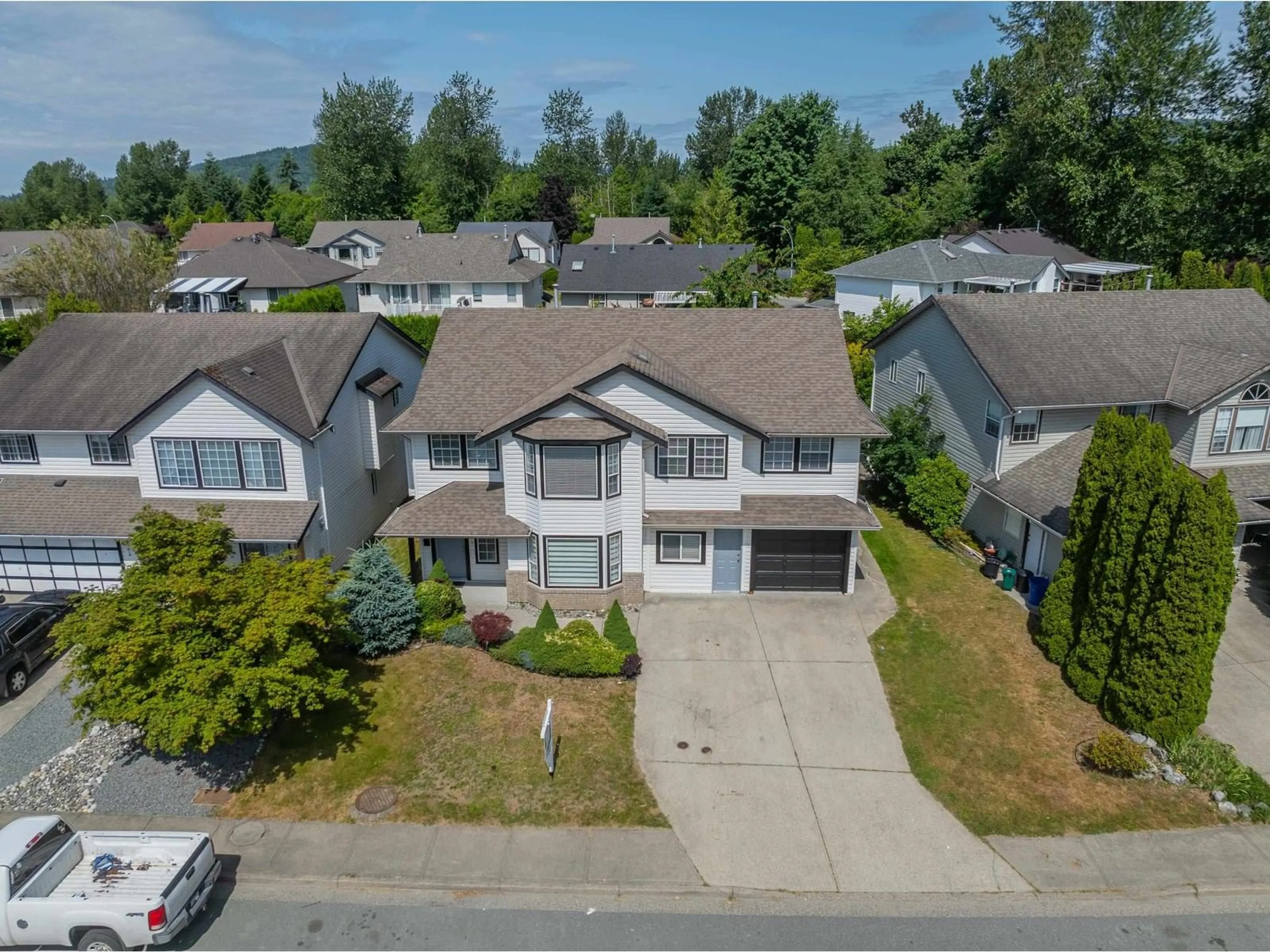 A pic from outside/outdoor area/front of a property/back of a property/a pic from drone, street for 8475 CADE BARR, Mission British Columbia V2V7K4