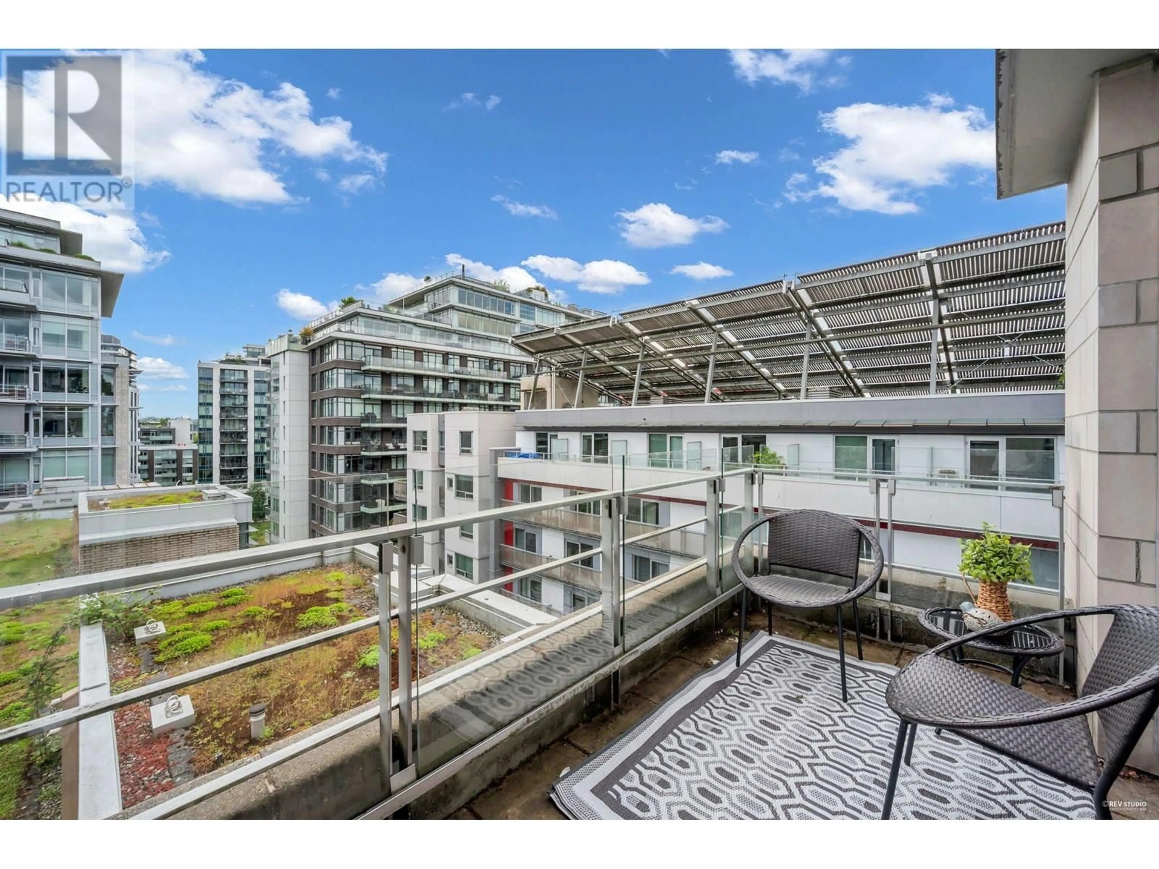 Balcony in the apartment, city buildings view from balcony for 701 - 77 WALTER HARDWICK AVENUE, Vancouver British Columbia V5Y0C6