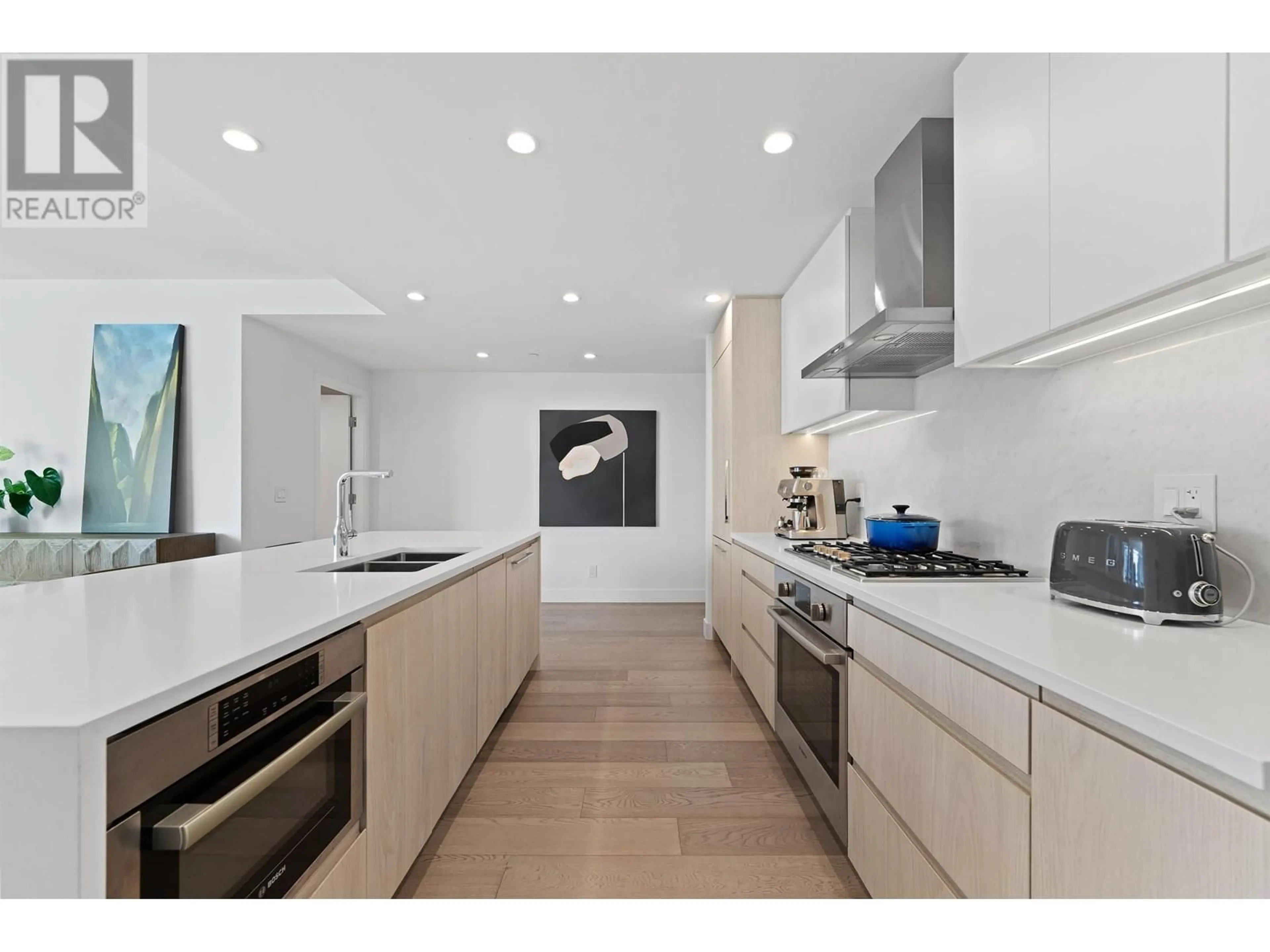 Contemporary kitchen, ceramic/tile floor for 404 - 177 3RD STREET, North Vancouver British Columbia V7M0G5