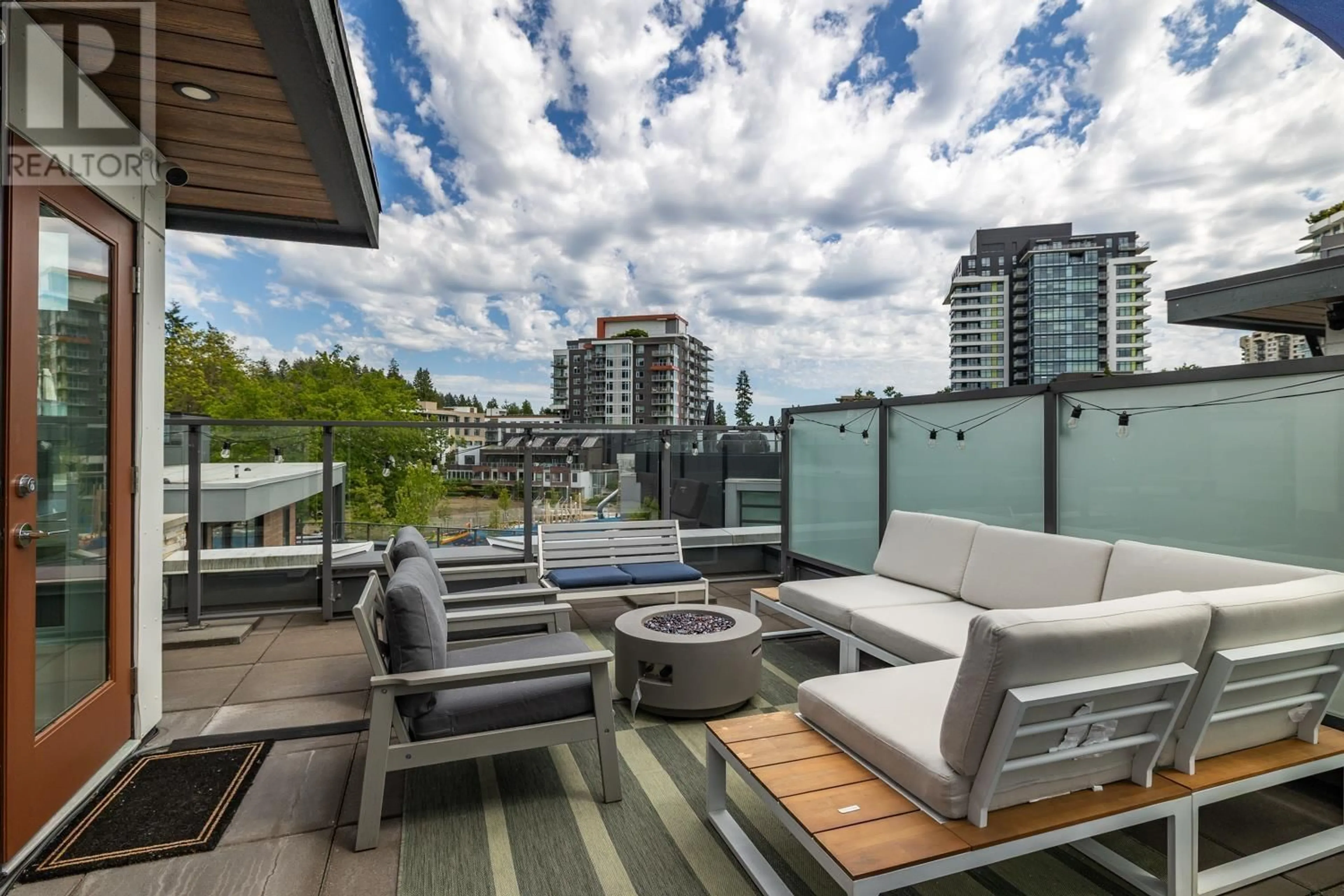 Patio, city buildings view from balcony for 238 - 2060 CURLING ROAD, North Vancouver British Columbia V7P0E1