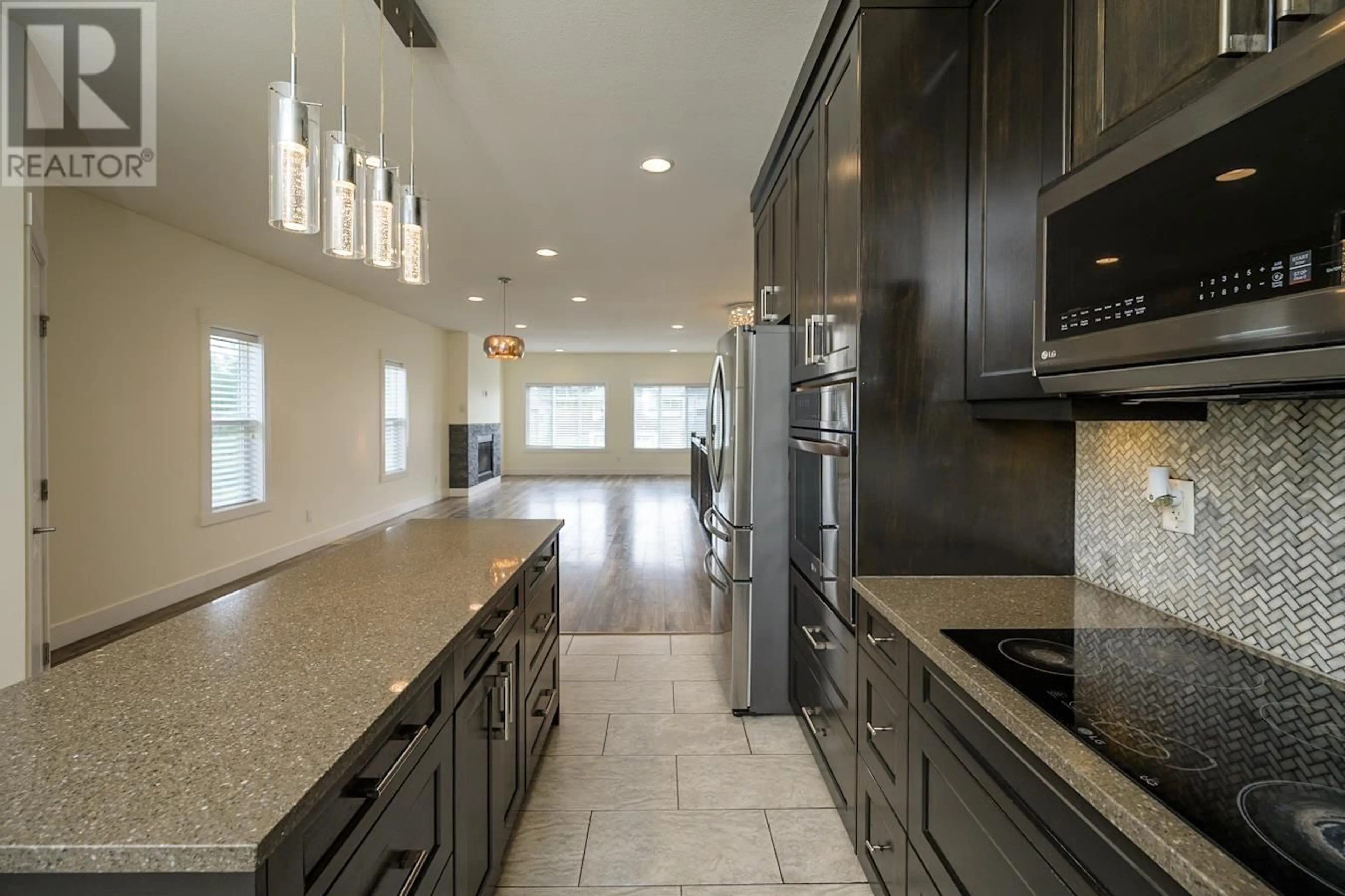 Open concept kitchen, ceramic/tile floor for 4606 GANNETT ROAD, Prince George British Columbia V2N0B7