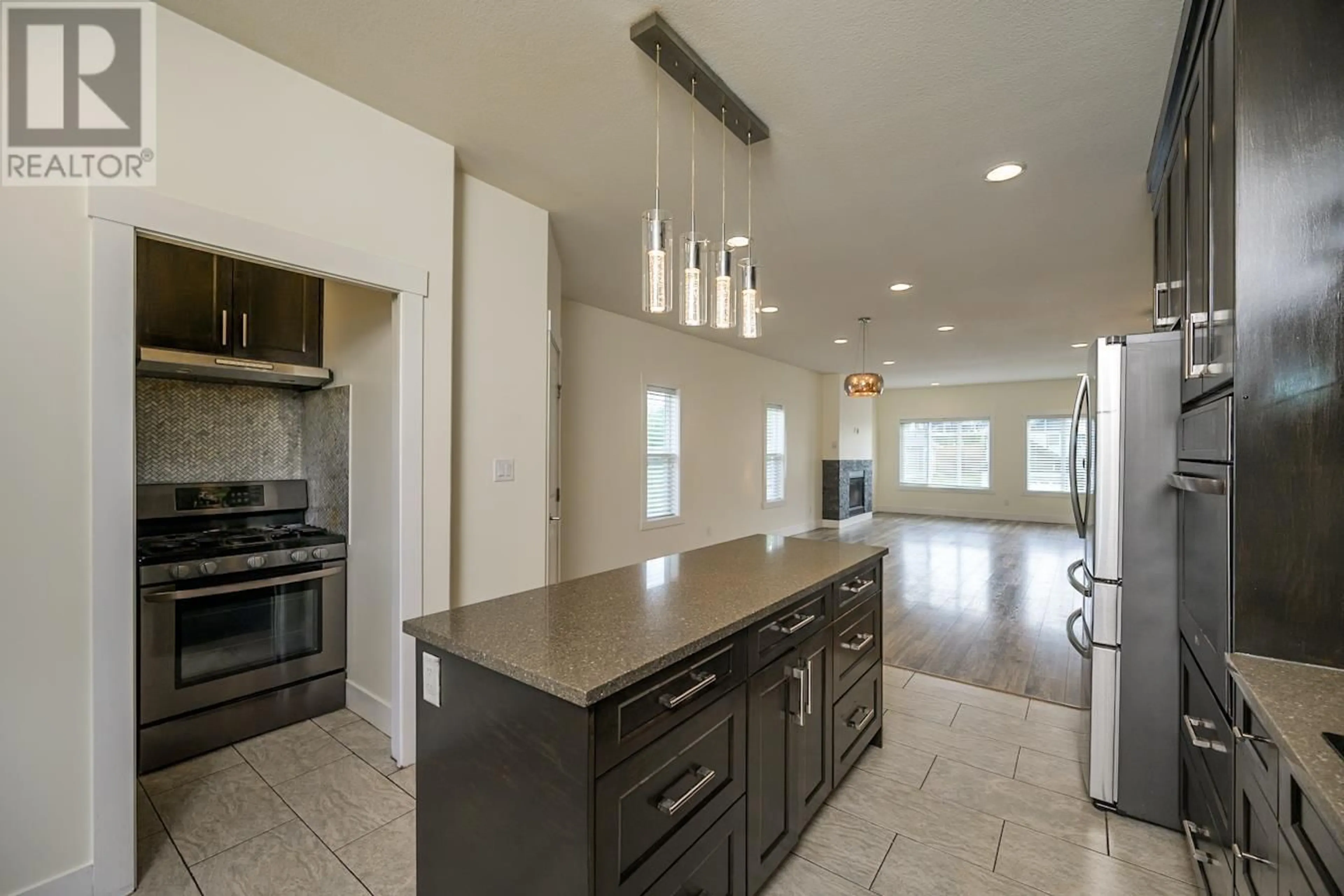 Open concept kitchen, ceramic/tile floor for 4606 GANNETT ROAD, Prince George British Columbia V2N0B7