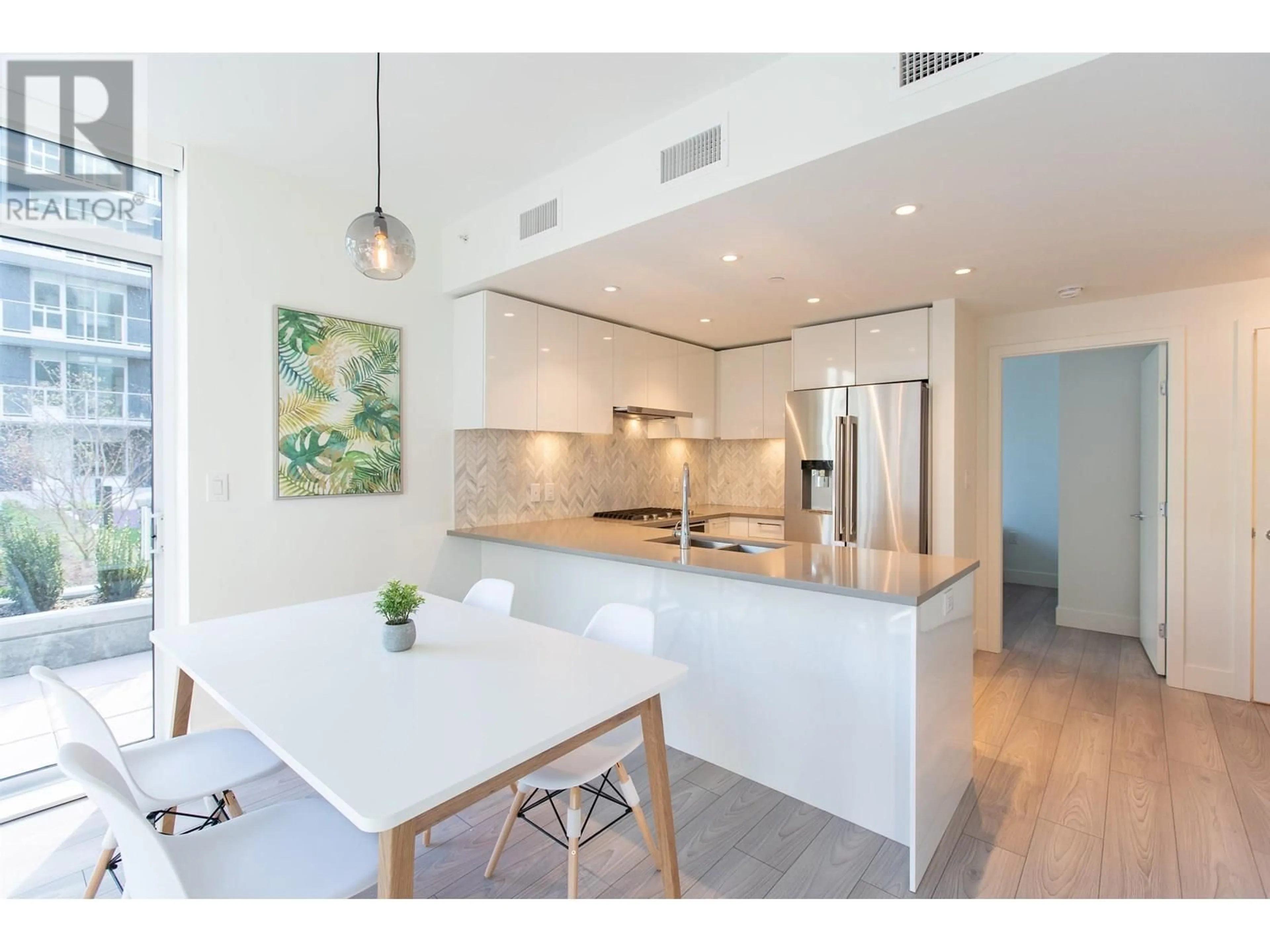 Open concept kitchen, unknown for 206 - 8570 RIVERGRASS DRIVE, Vancouver British Columbia V5S0H4