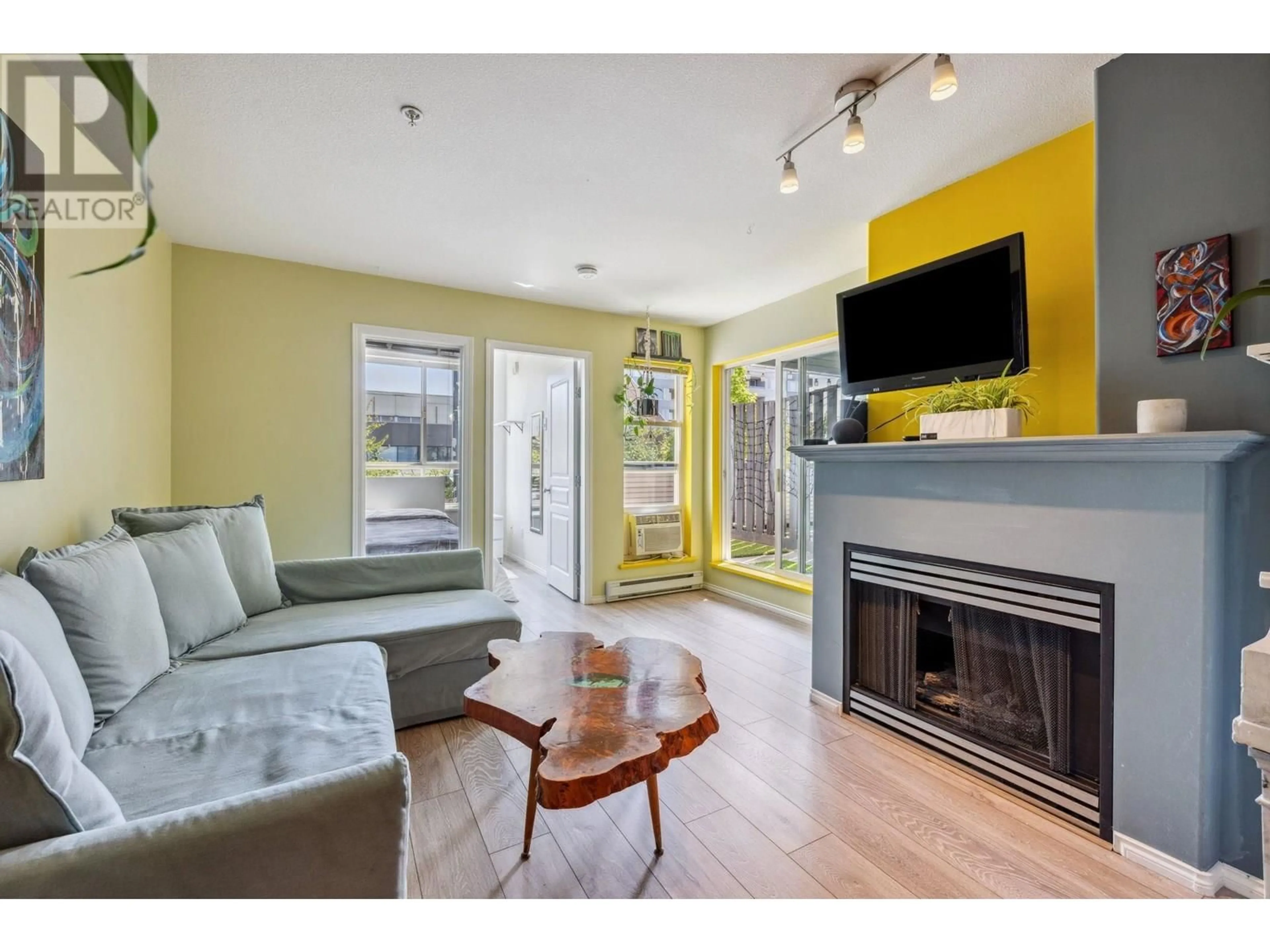 Living room with furniture, unknown for 202 - 3939 HASTINGS STREET, Burnaby British Columbia V5C2H8