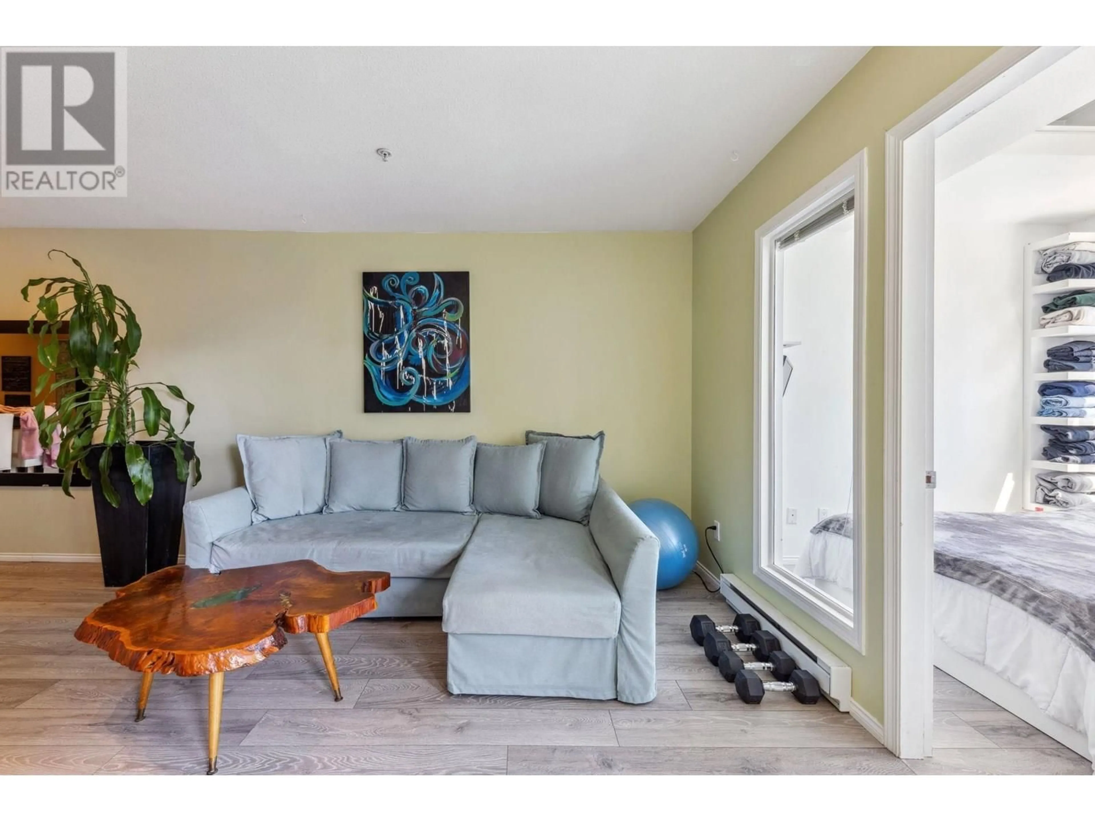 Living room with furniture, unknown for 202 - 3939 HASTINGS STREET, Burnaby British Columbia V5C2H8