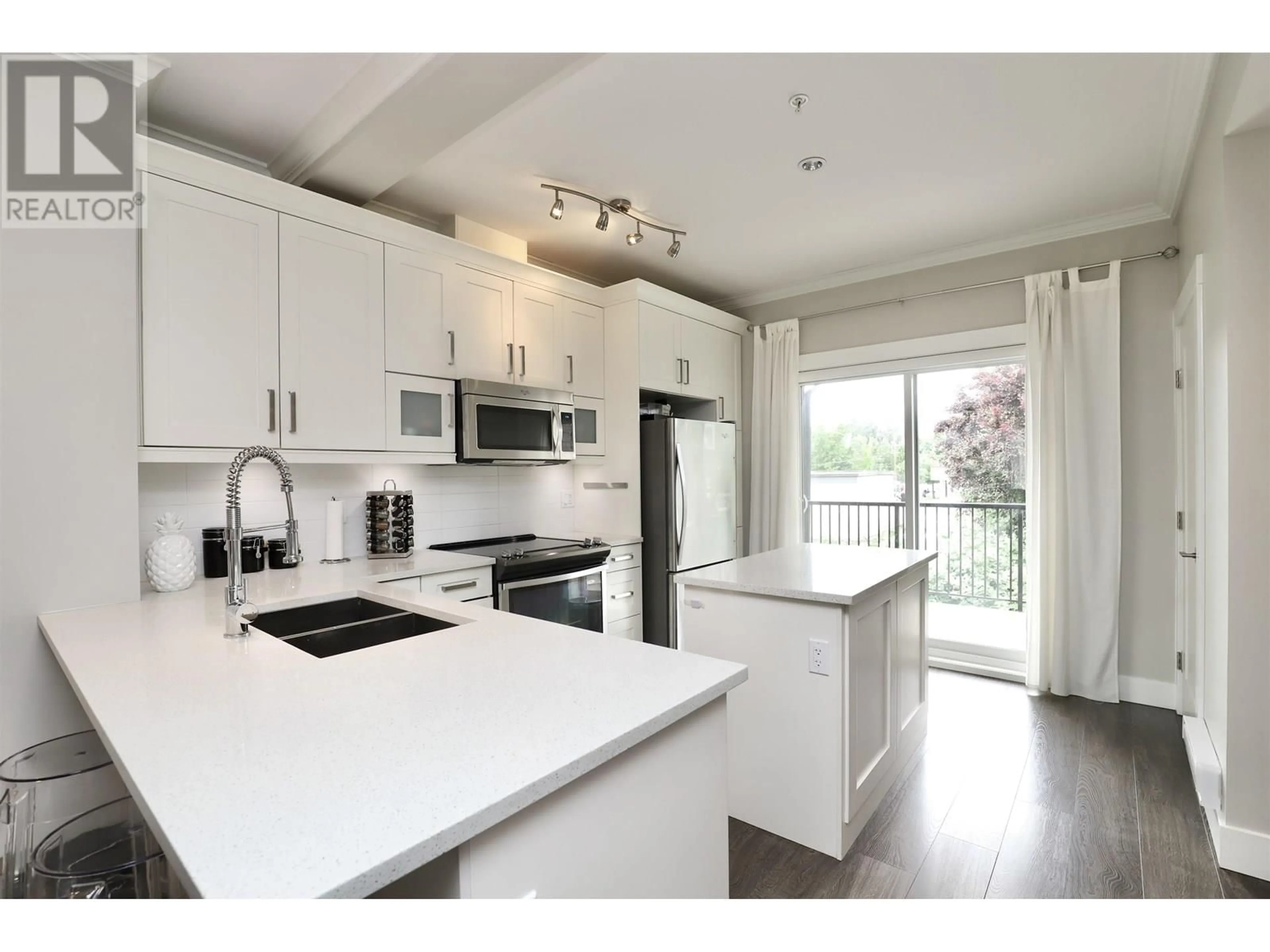 Open concept kitchen, wood/laminate floor for 29 - 10151 240 STREET, Maple Ridge British Columbia V2W0G9