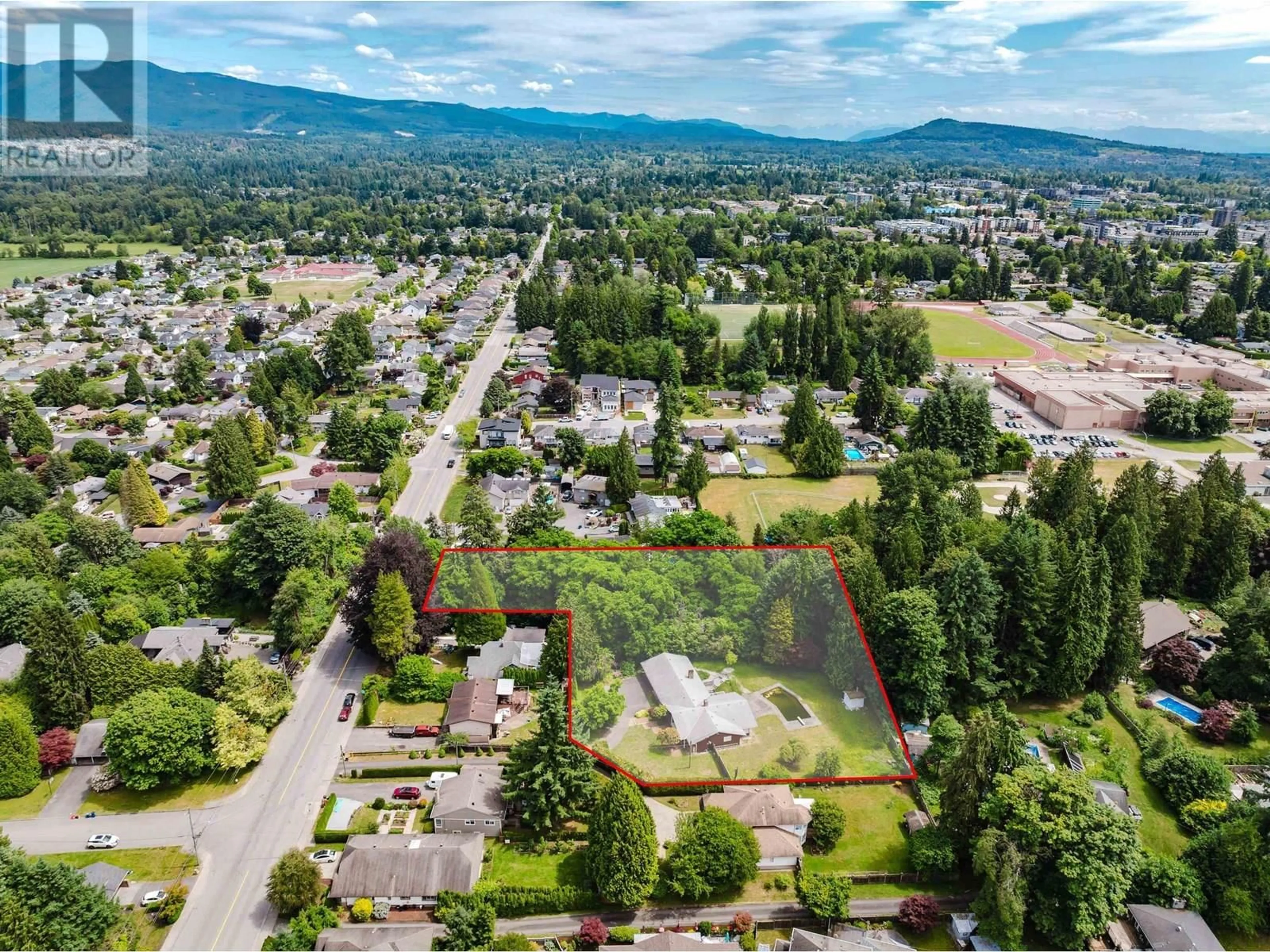 A pic from outside/outdoor area/front of a property/back of a property/a pic from drone, mountain view for 21764 124 AVENUE, Maple Ridge British Columbia V2X4H7